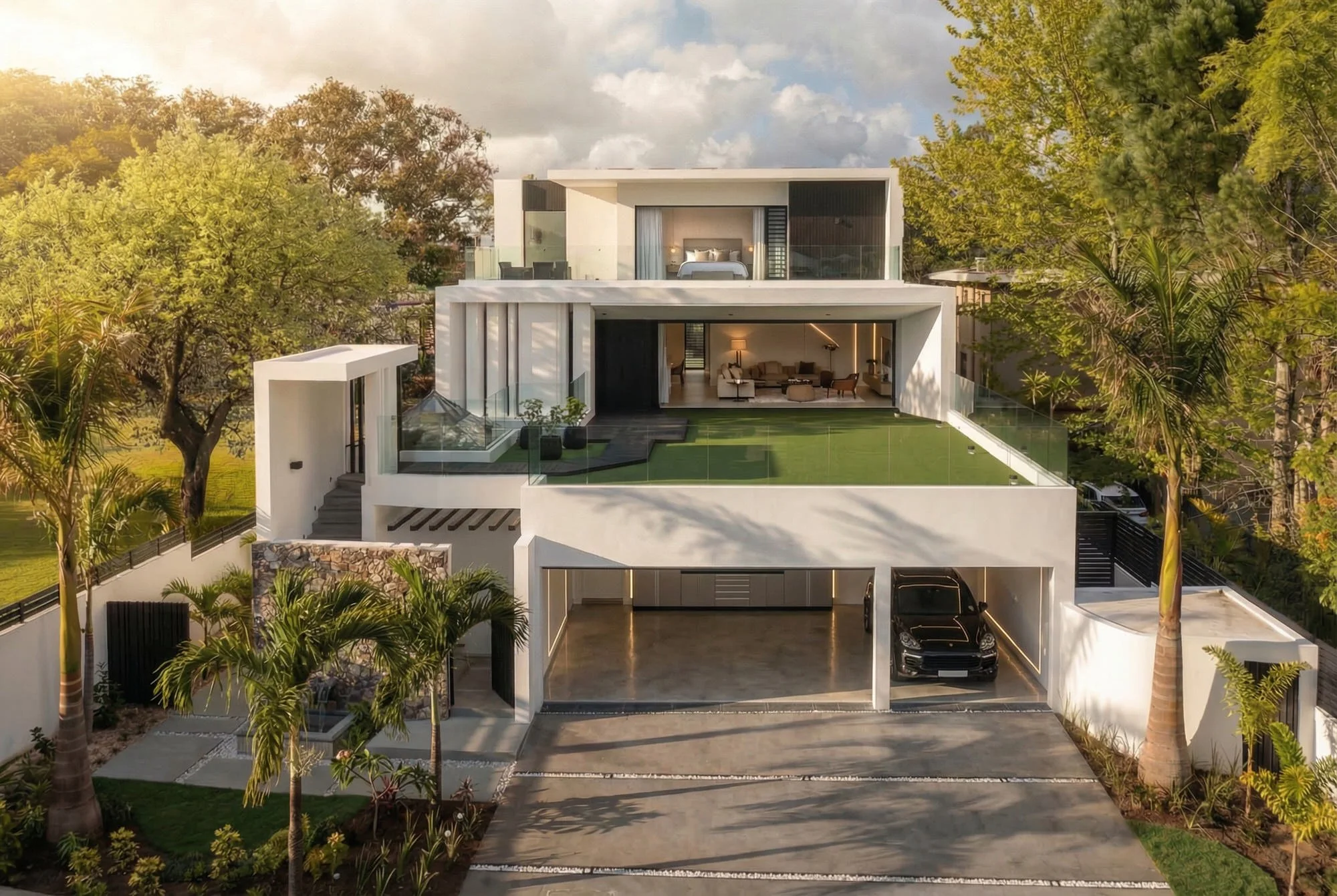KMK residence, Mauritius — layered contemporary volumes on a sloping site.