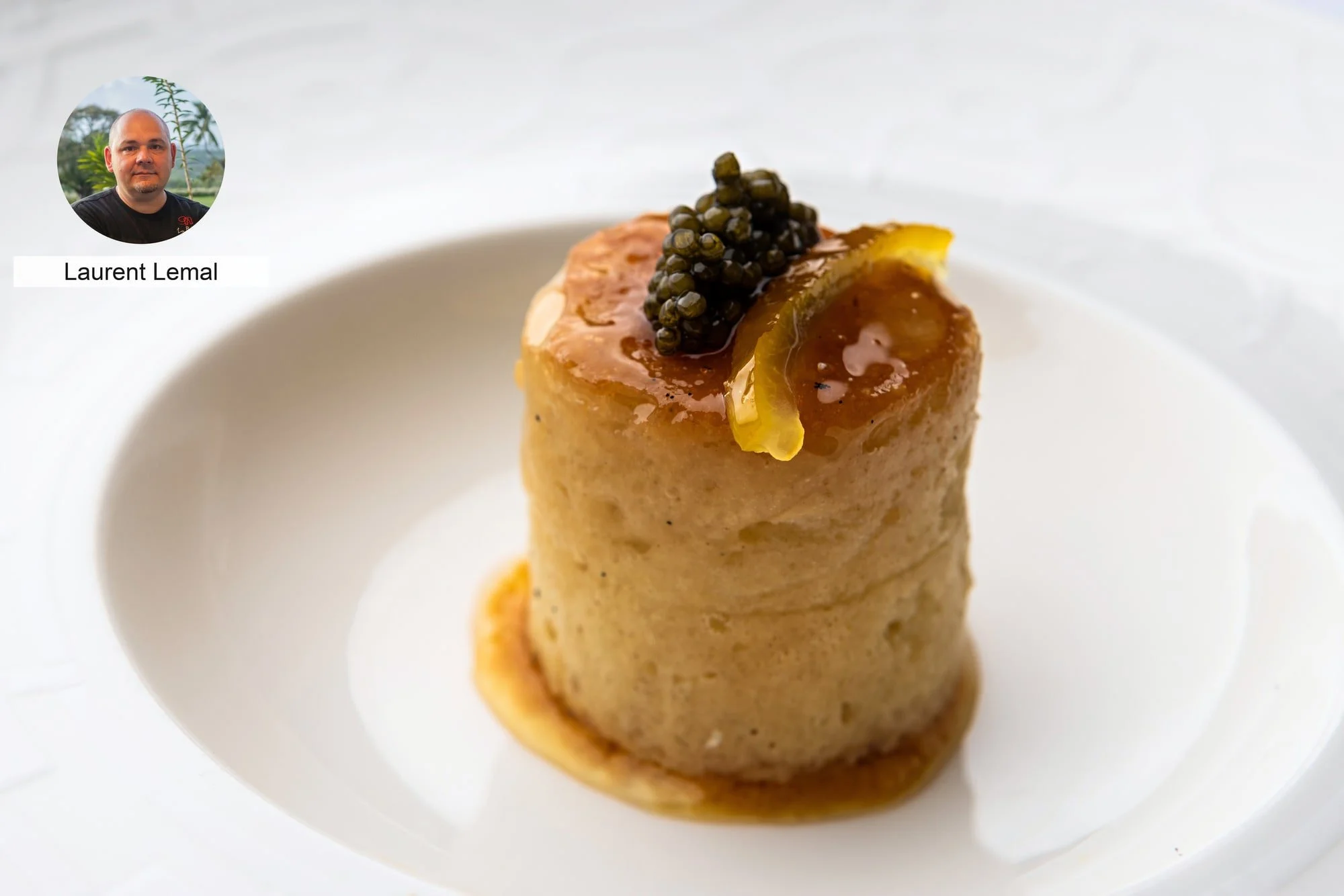 Golden cylindrical creation topped with caviar by chef Laurent Lemal.