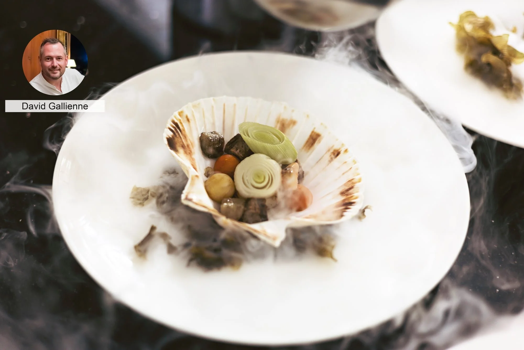 Shellfish dish with aromatic steam by chef David Gallienne, photographed during service.