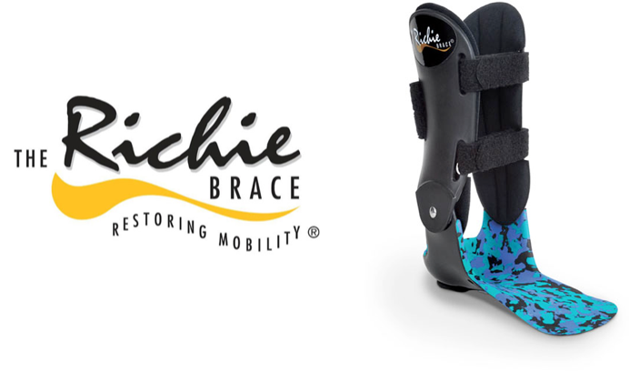 The Richie Brace, an orthopedic ankle and foot brace with adjustable straps, black exterior, and a blue and black camo patterned sole.