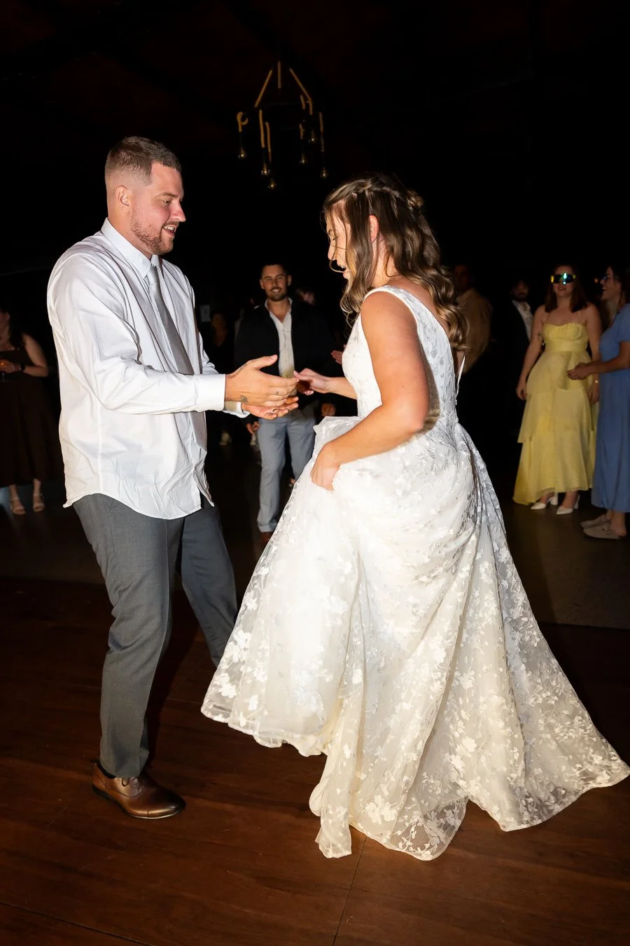 bride Chiarra and groom Ben dancing together in dance floor in Western Ridge