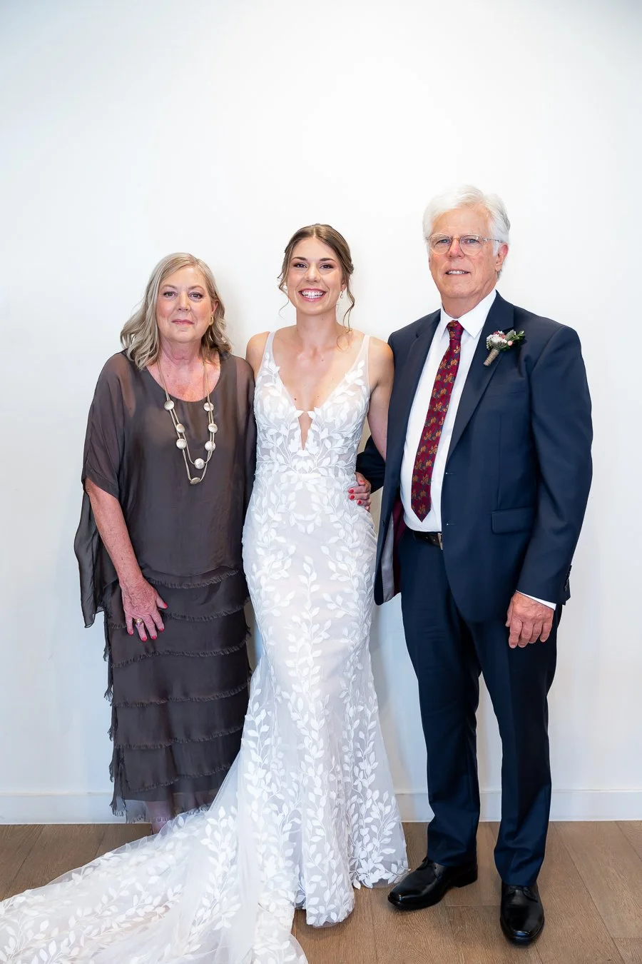 bride Sonya with her mum and dad