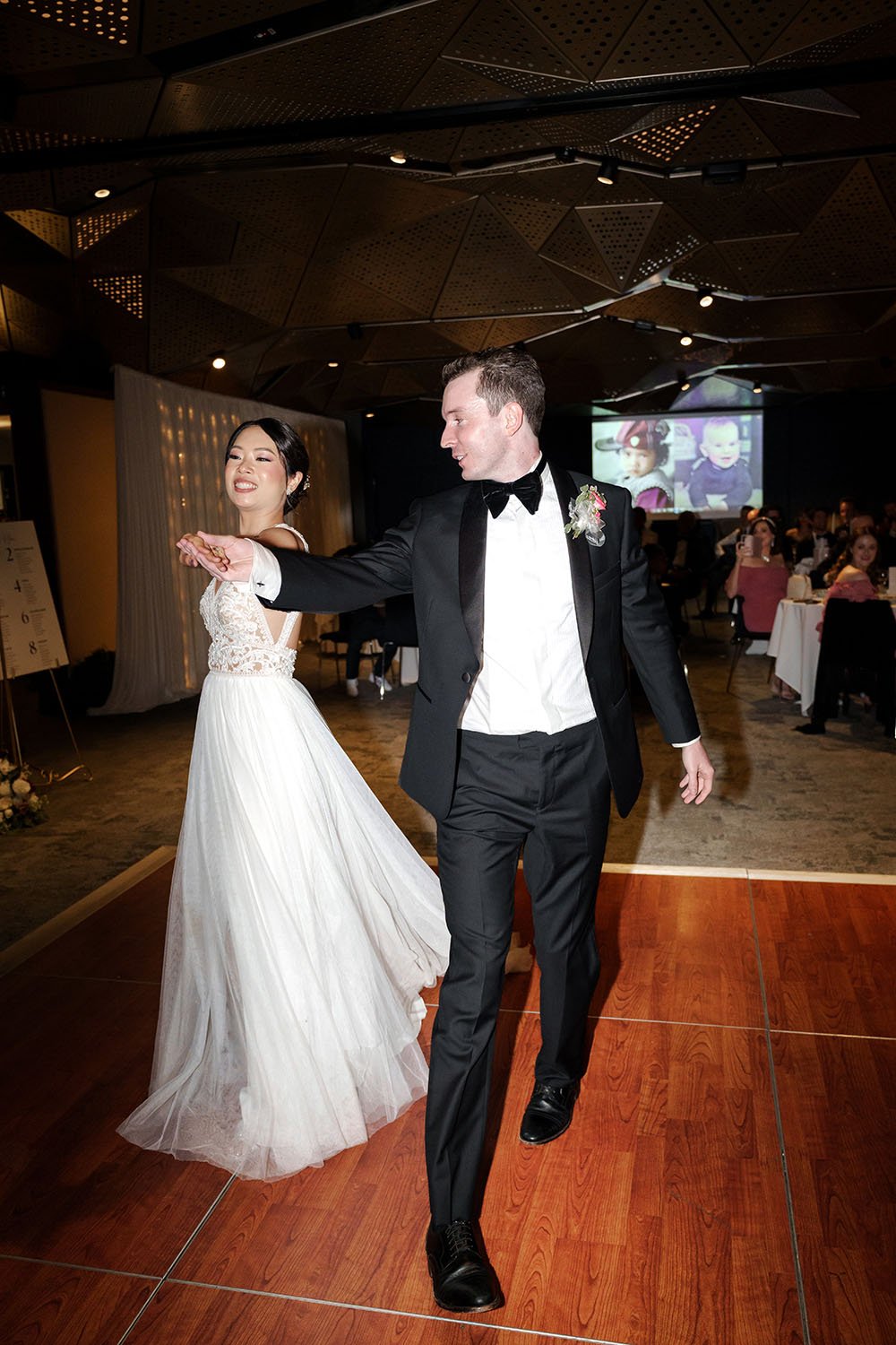 Nori and Cliffe hands stretching in their first dance