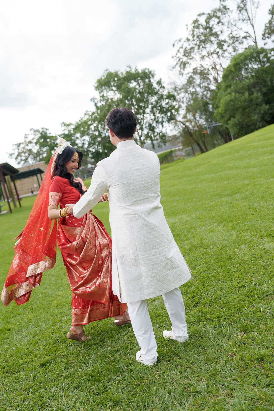 Amrita and Casey spinning each other around