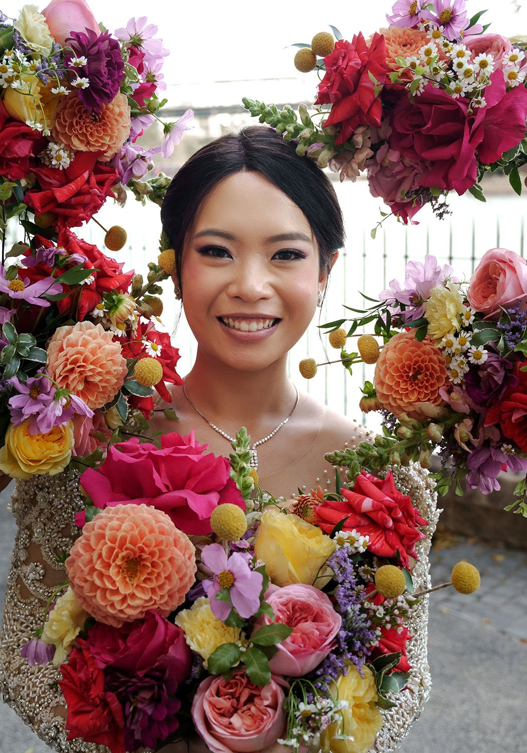 flower around bride Nori's head