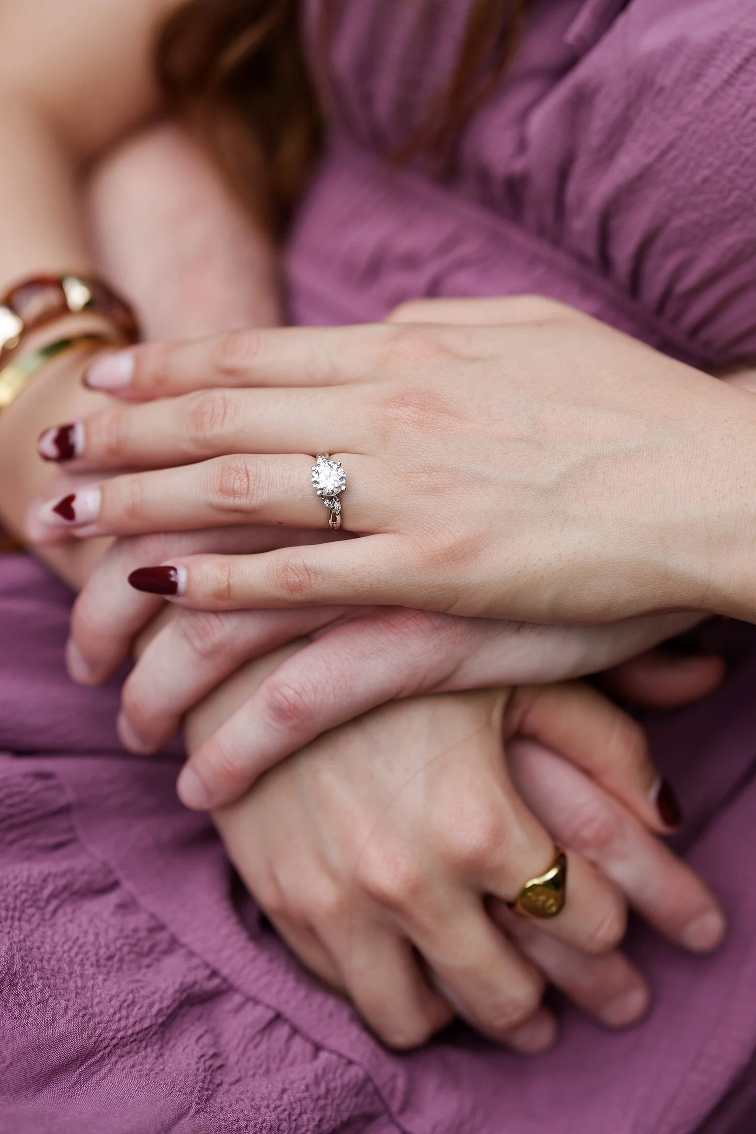 engagement ring on Ruby's finger