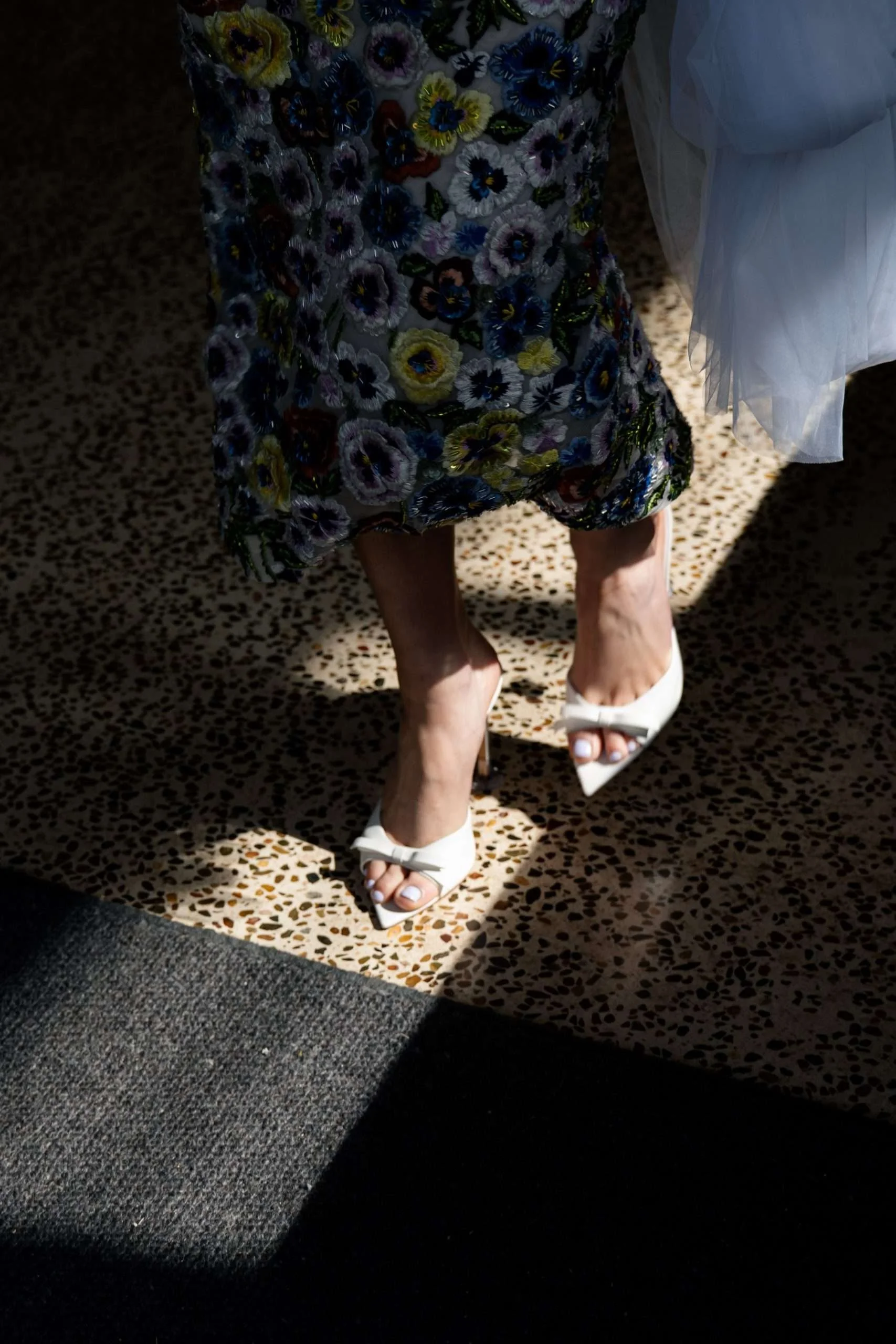 Bride Charlotte’s feet as she walks gracefully.