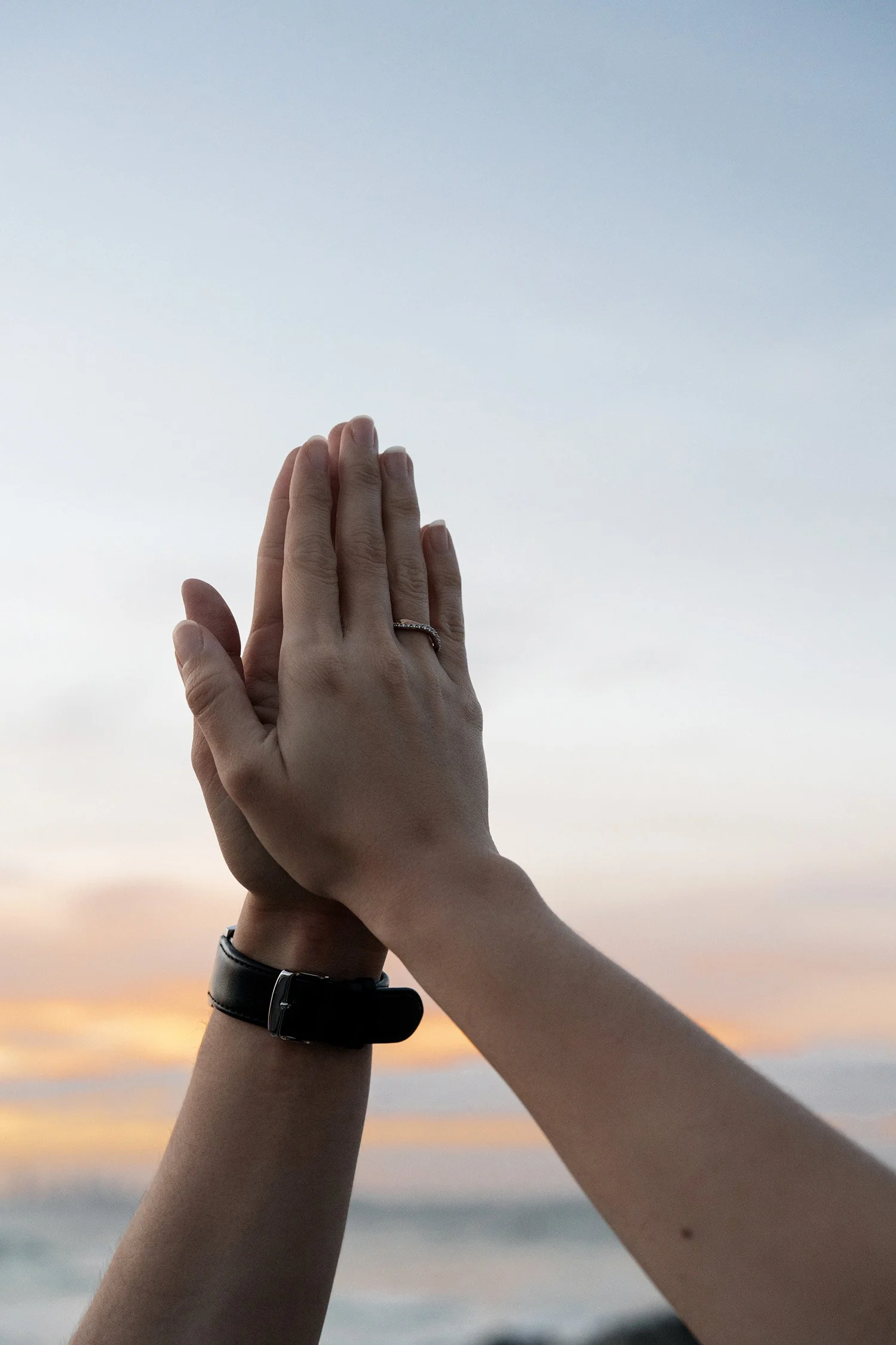 hands up and engagement ring