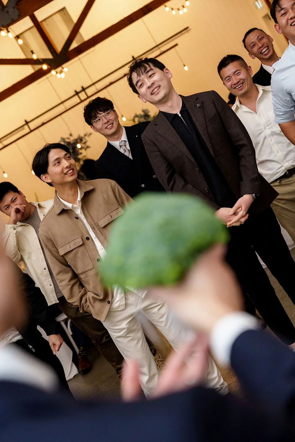 Michael holding a broccoli to all unmarried male