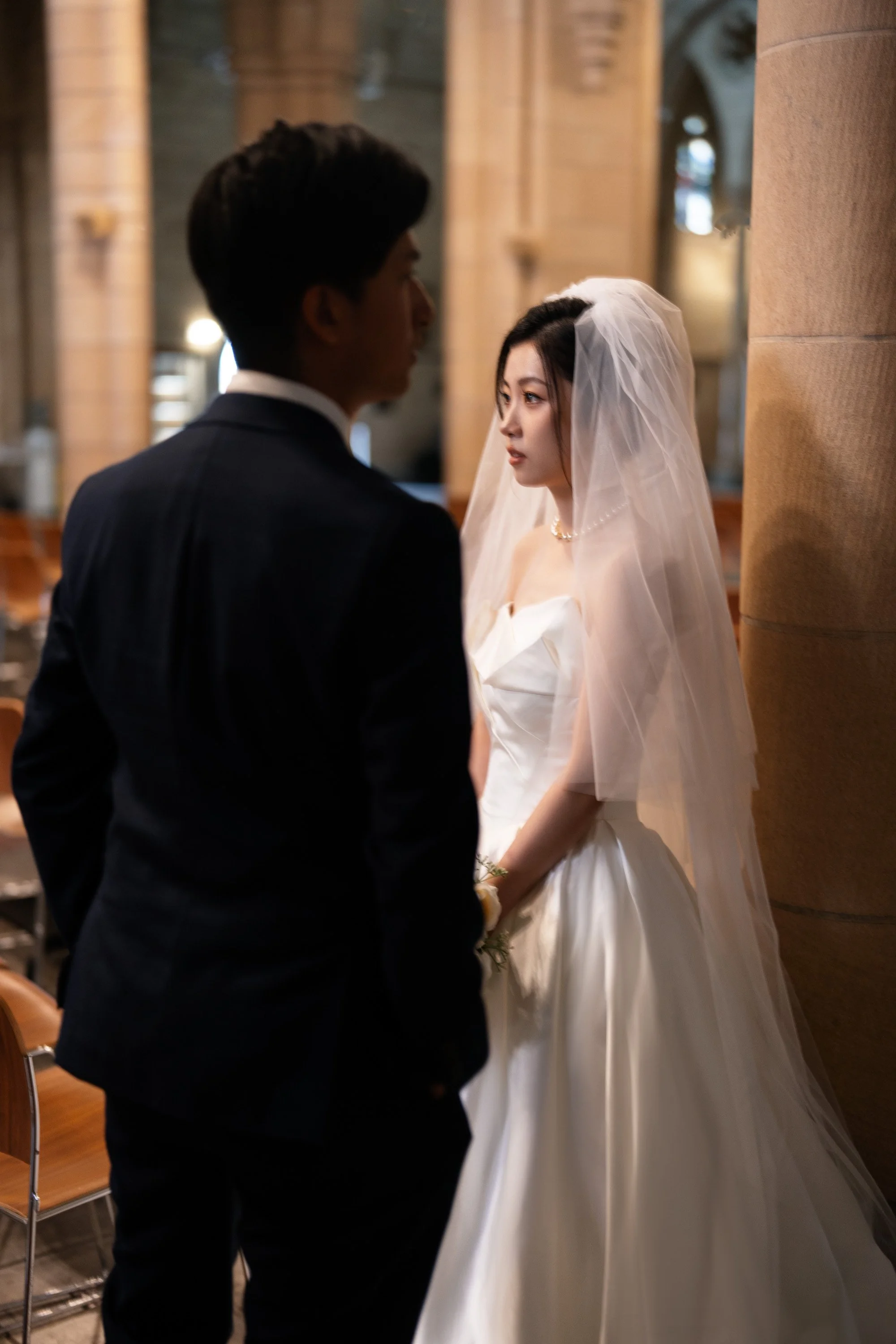 bride Cassie look at front and groom Leo look to his right side