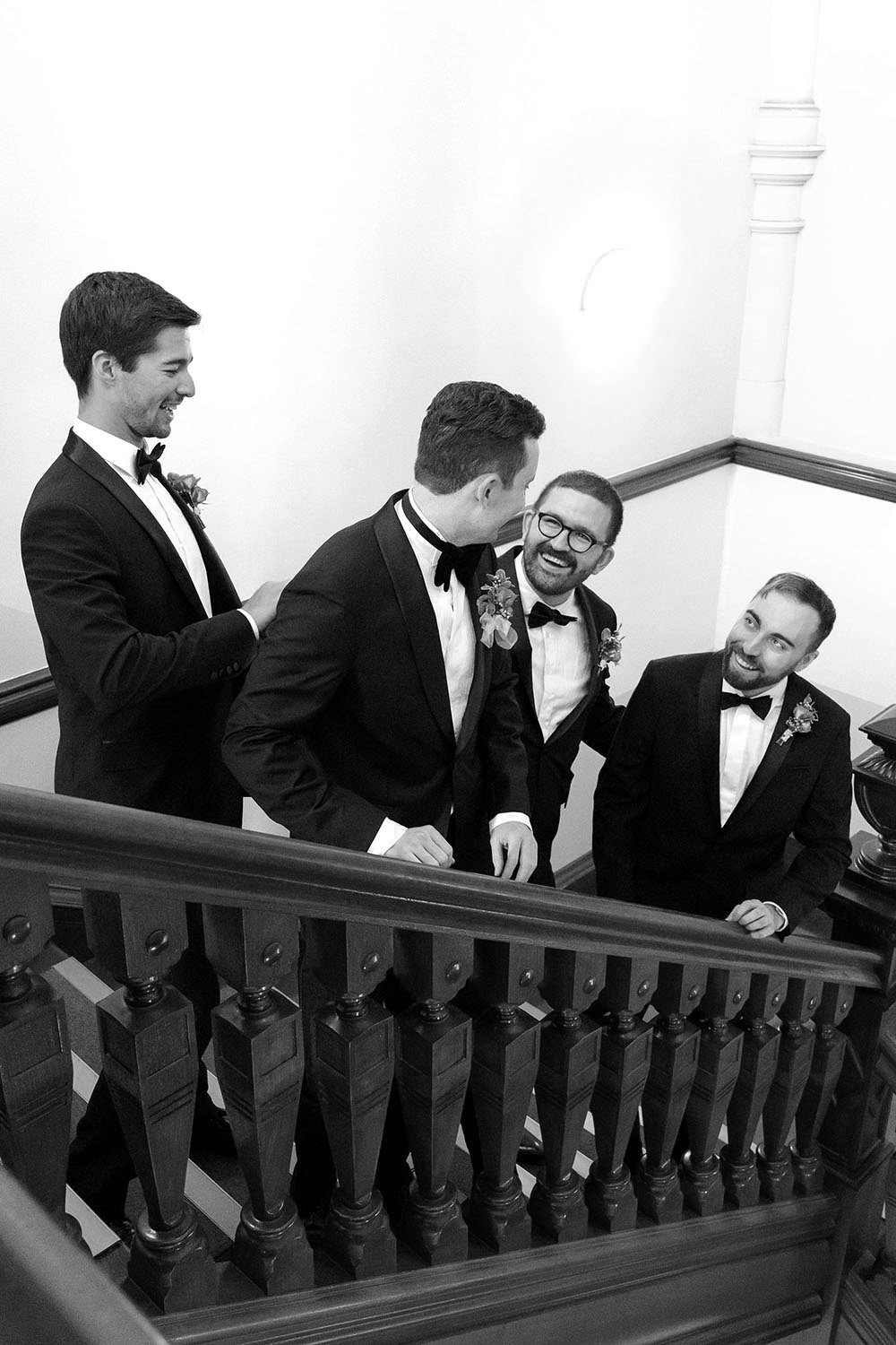 groom Cliffe's talking on stairs
