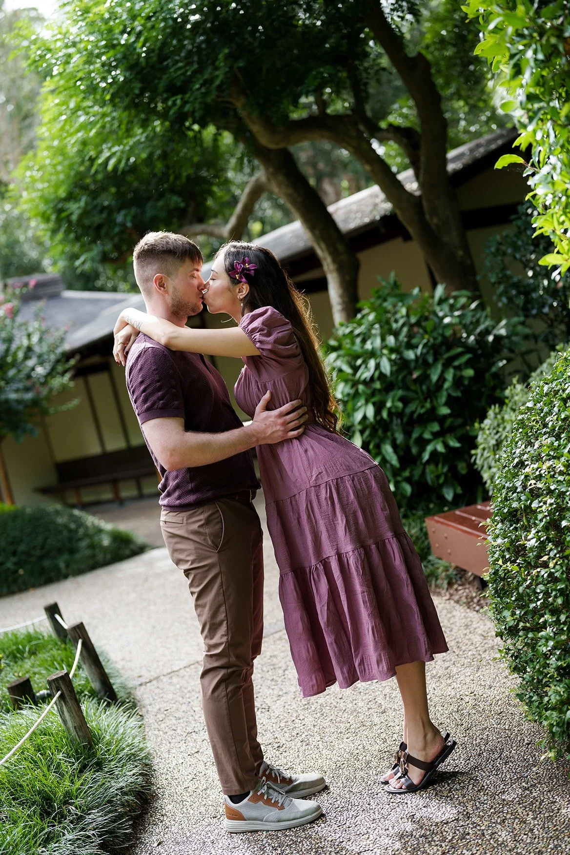 Ruby and Kyle kissing in Japanese garden Brisbane Botanic Gardens Mt Coot-tha