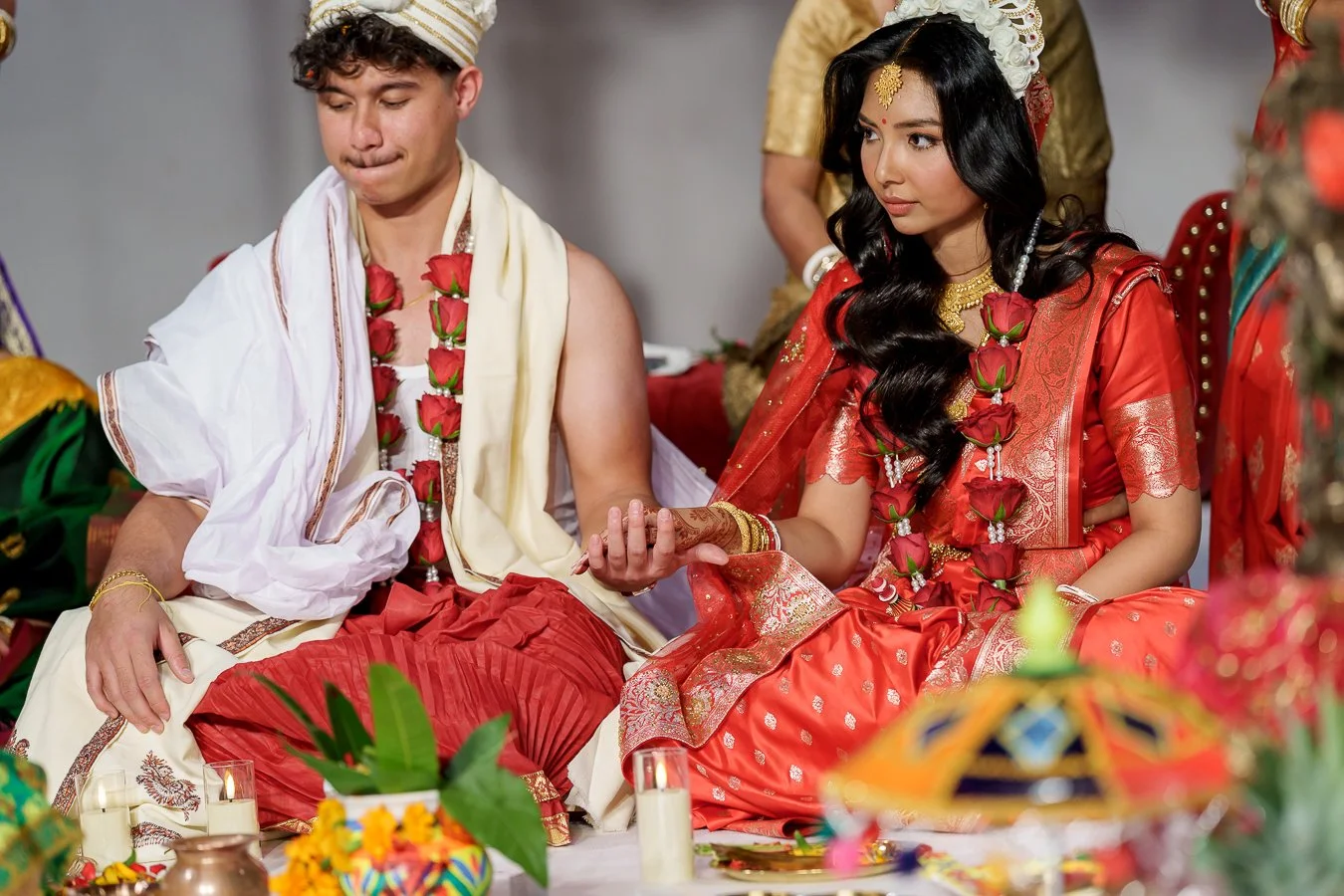 untie blessing the wedding ring and pass it to Casey