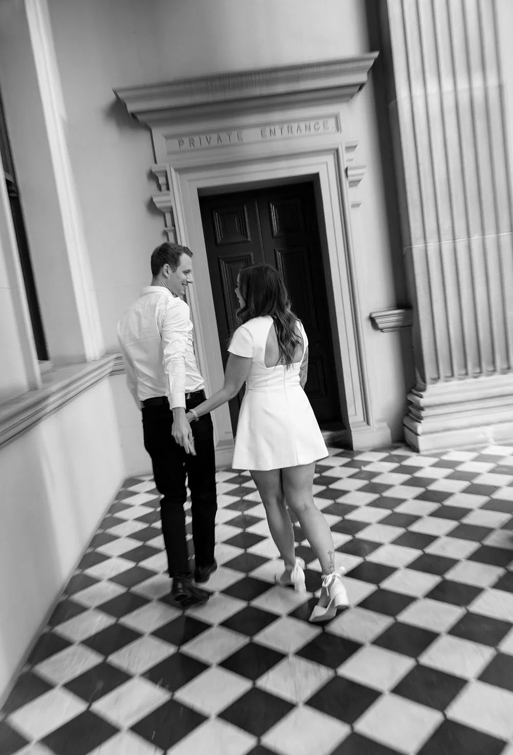 Brenna and Morgan walking away from the camera