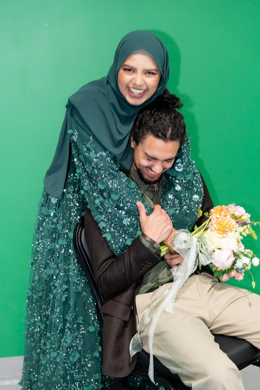 Afifah wrap around her arm to Junaid making him laughing