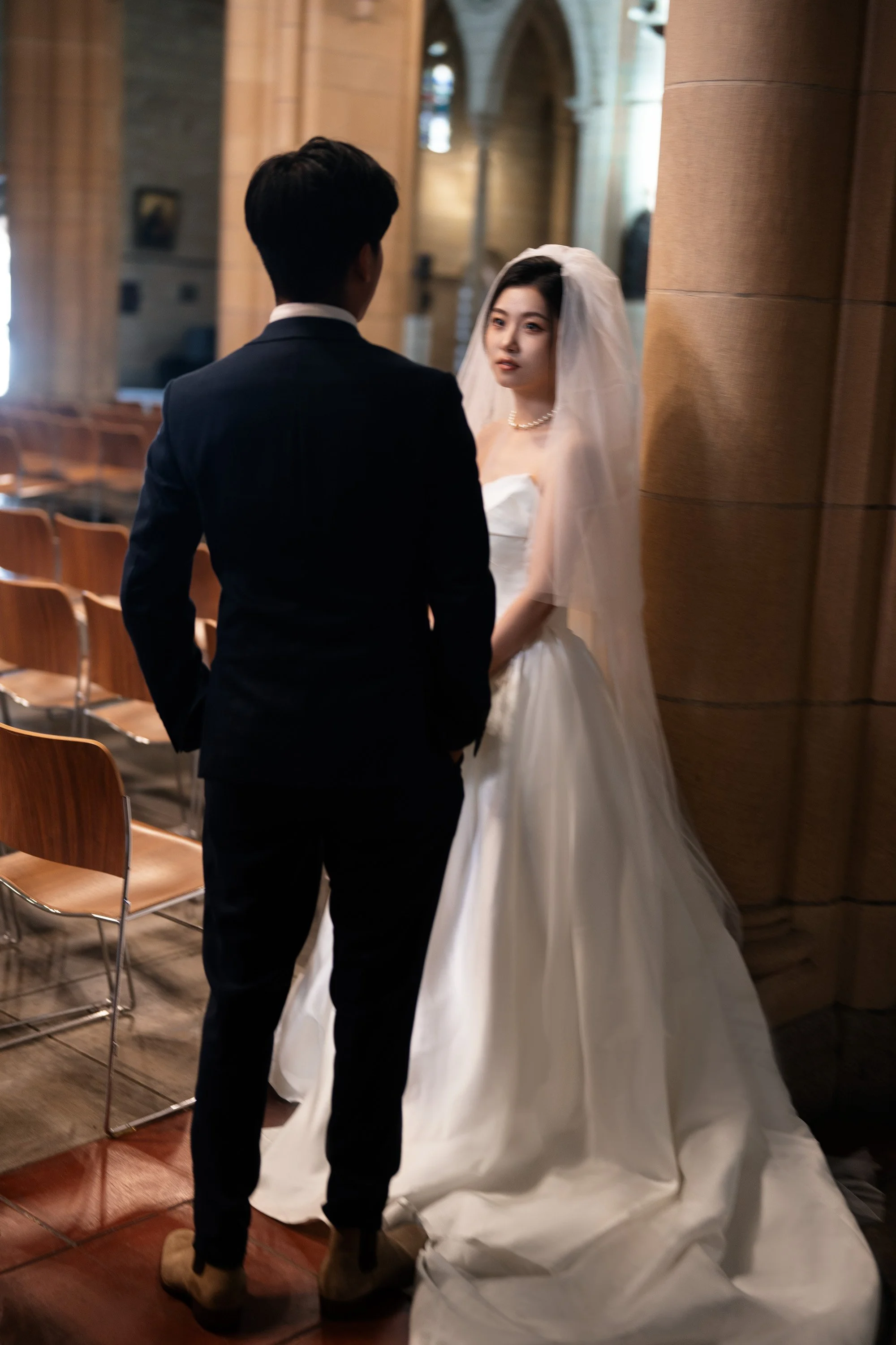 bride Cassie look at groom Leo