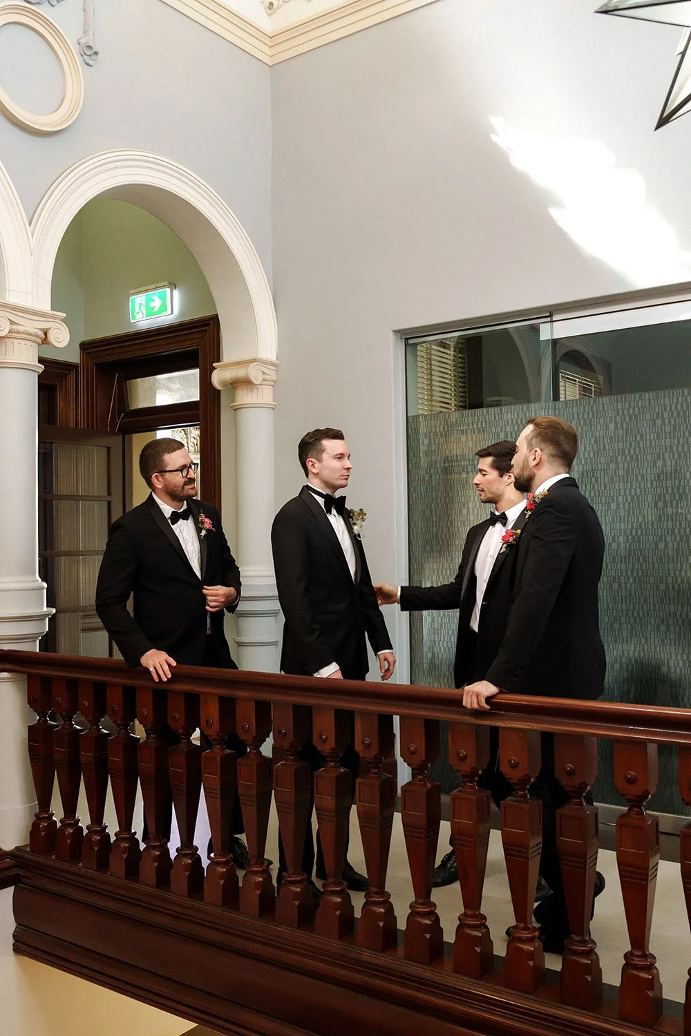 groom Cliffe's groomsmen checking him