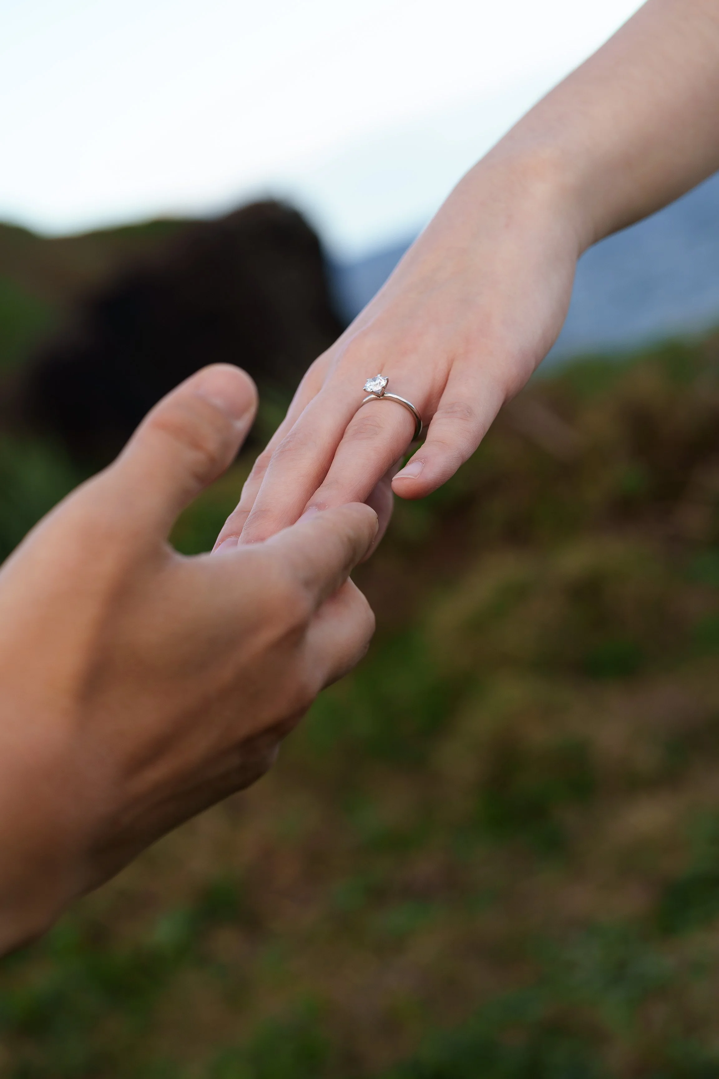 hands and engagement ring