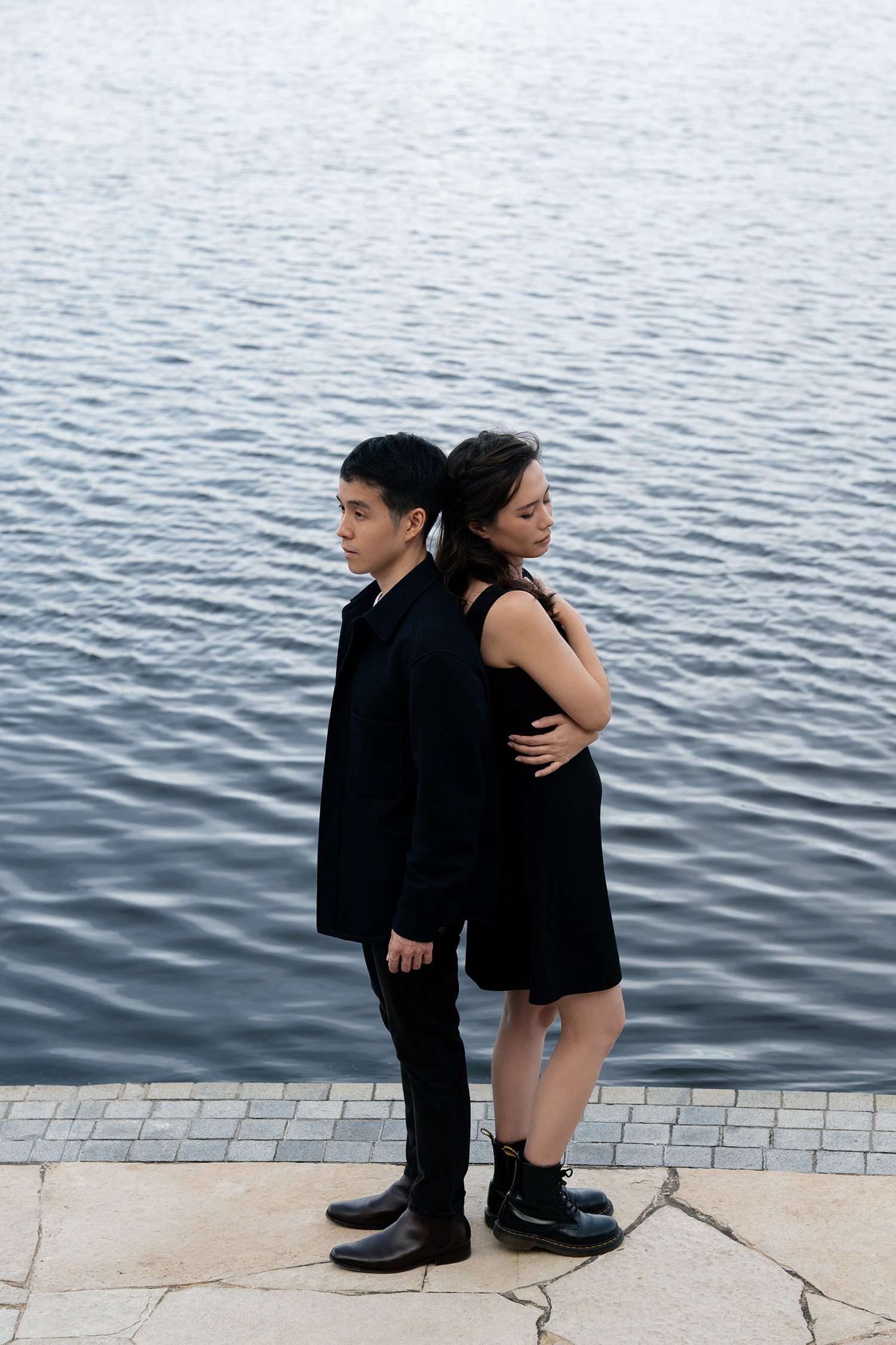 Krystel and Paul back against back, Brisbane engagement photography
