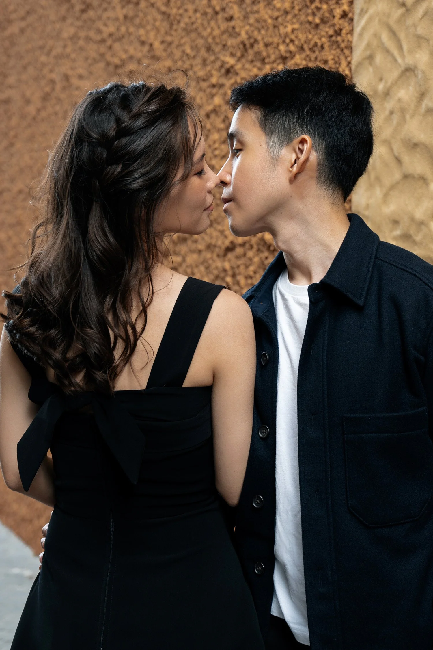 Paul and Krystel try to kissing in Emerald Lakes Village