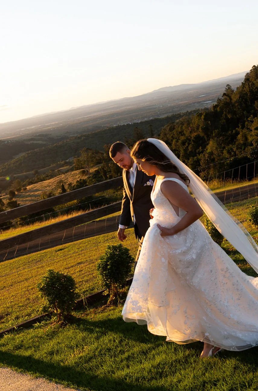 Chiarra look down walk with groom Ben