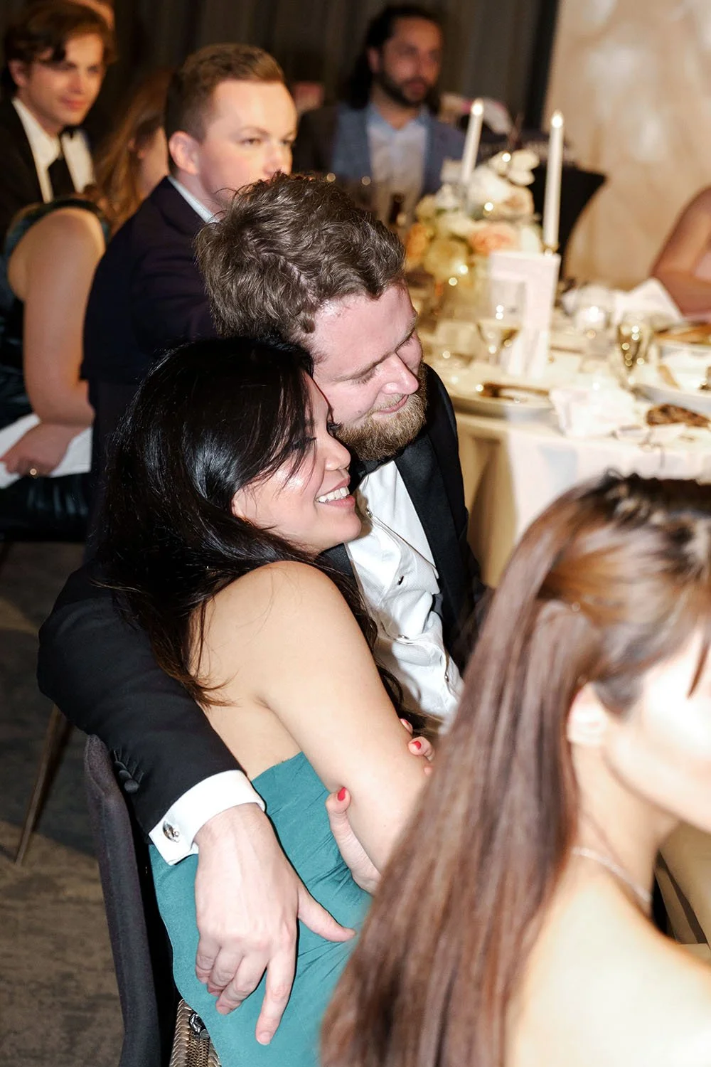two guests hugging