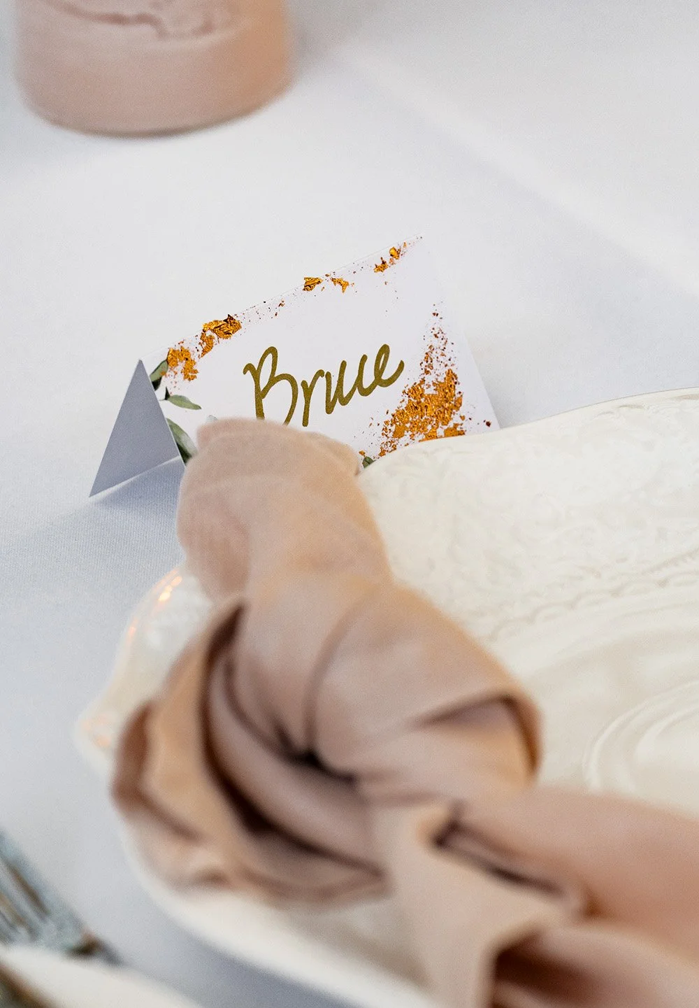 Brus's name card on table