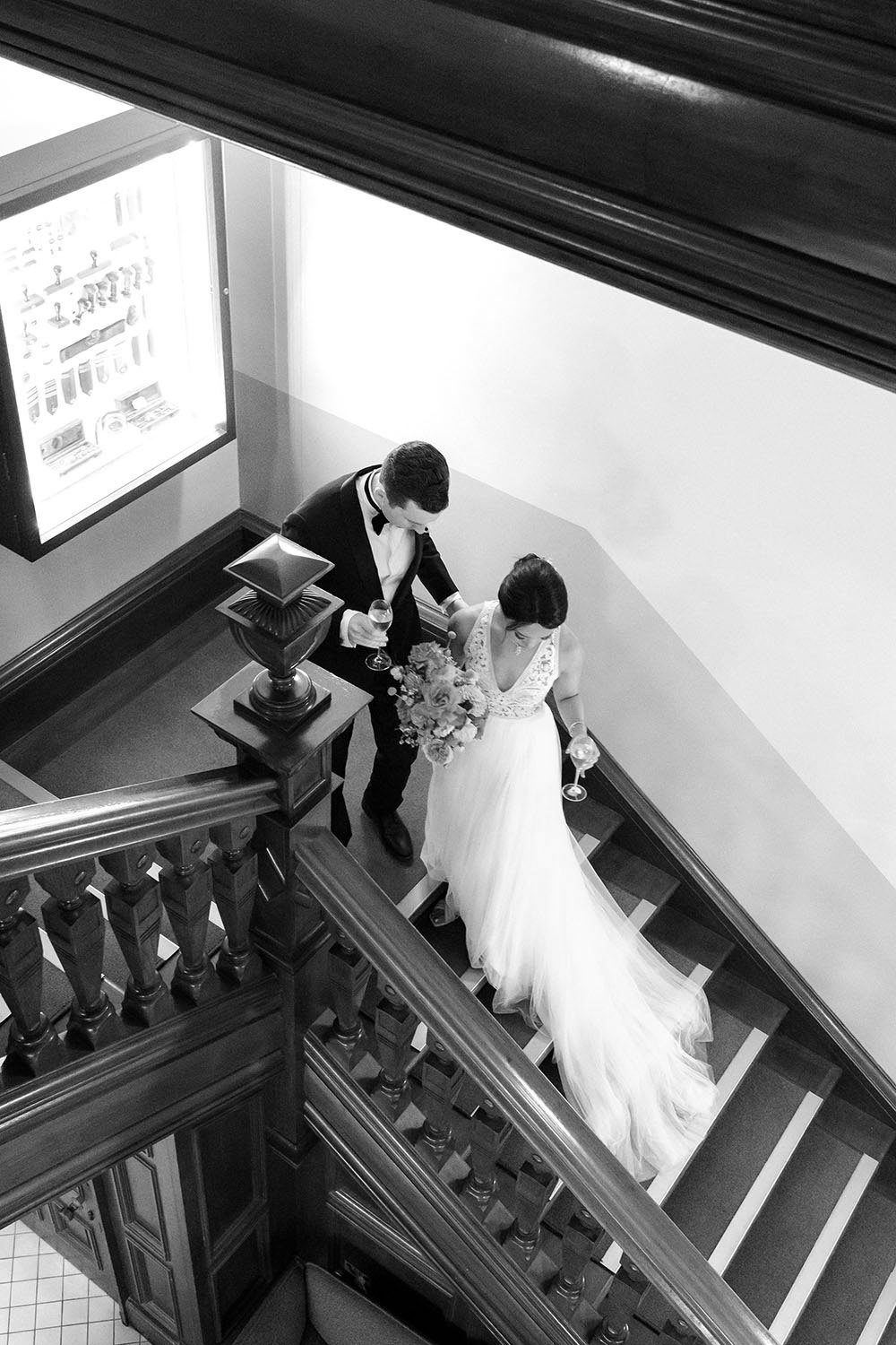 bride Nori and groom Cliffe starting walking down the stairs