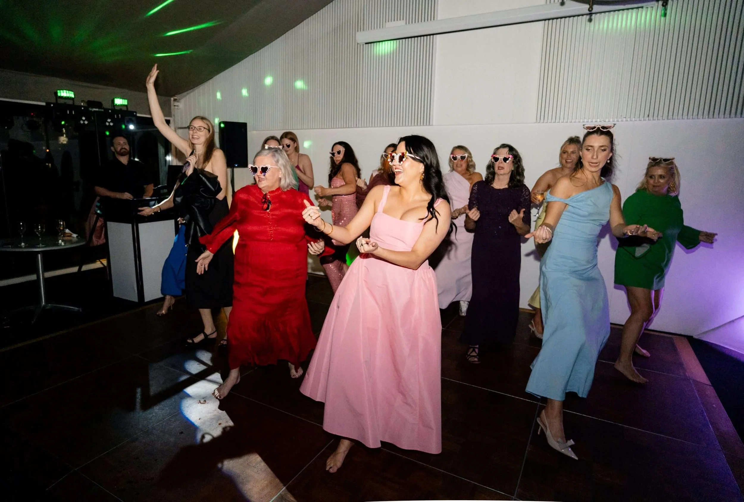 a group of ladies dancing