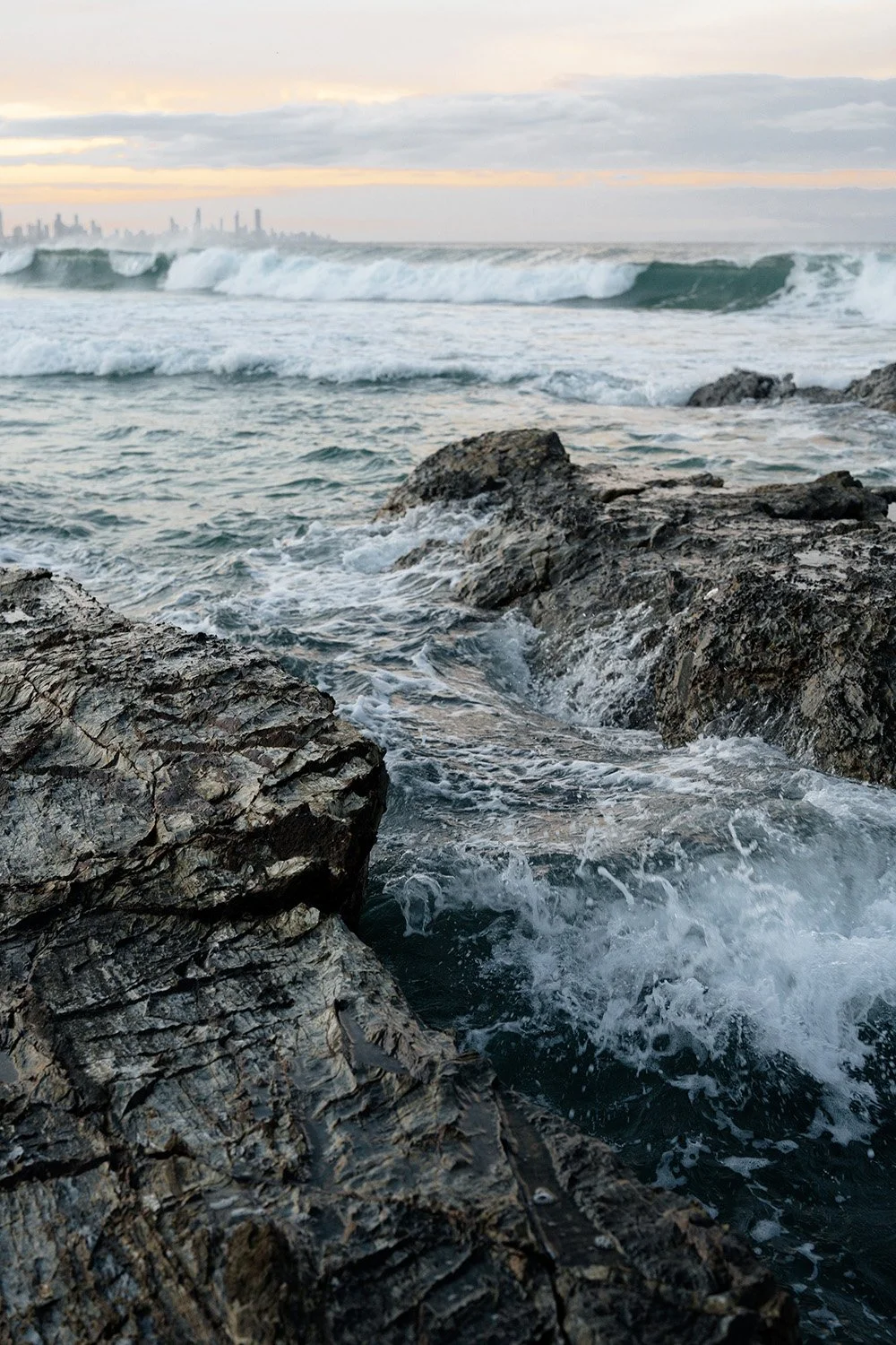 ocean waves and Gold Coast city background