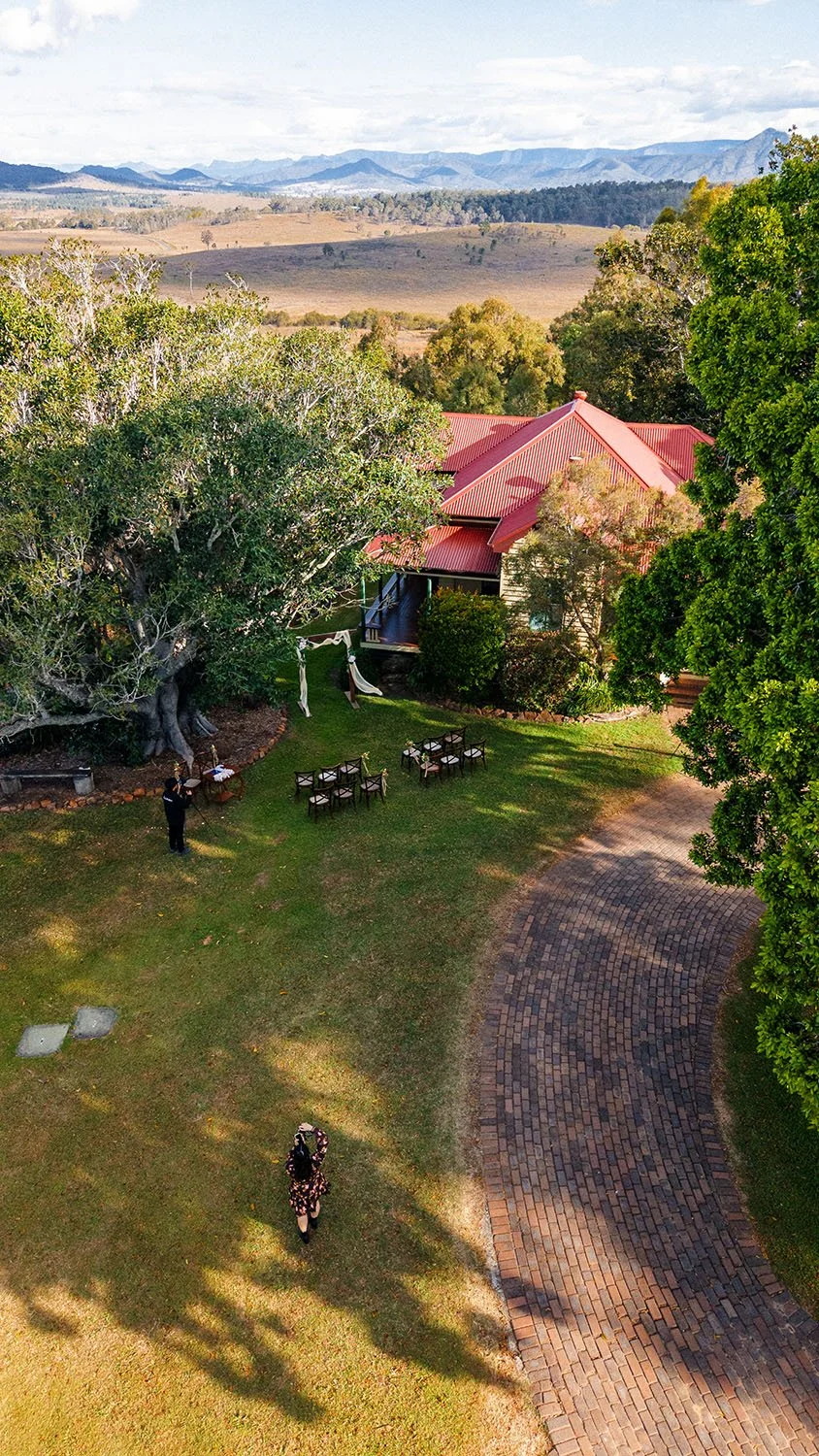 drone vie of Flora and Eric's wedding ceremony set up in Spicers Hidden Vale