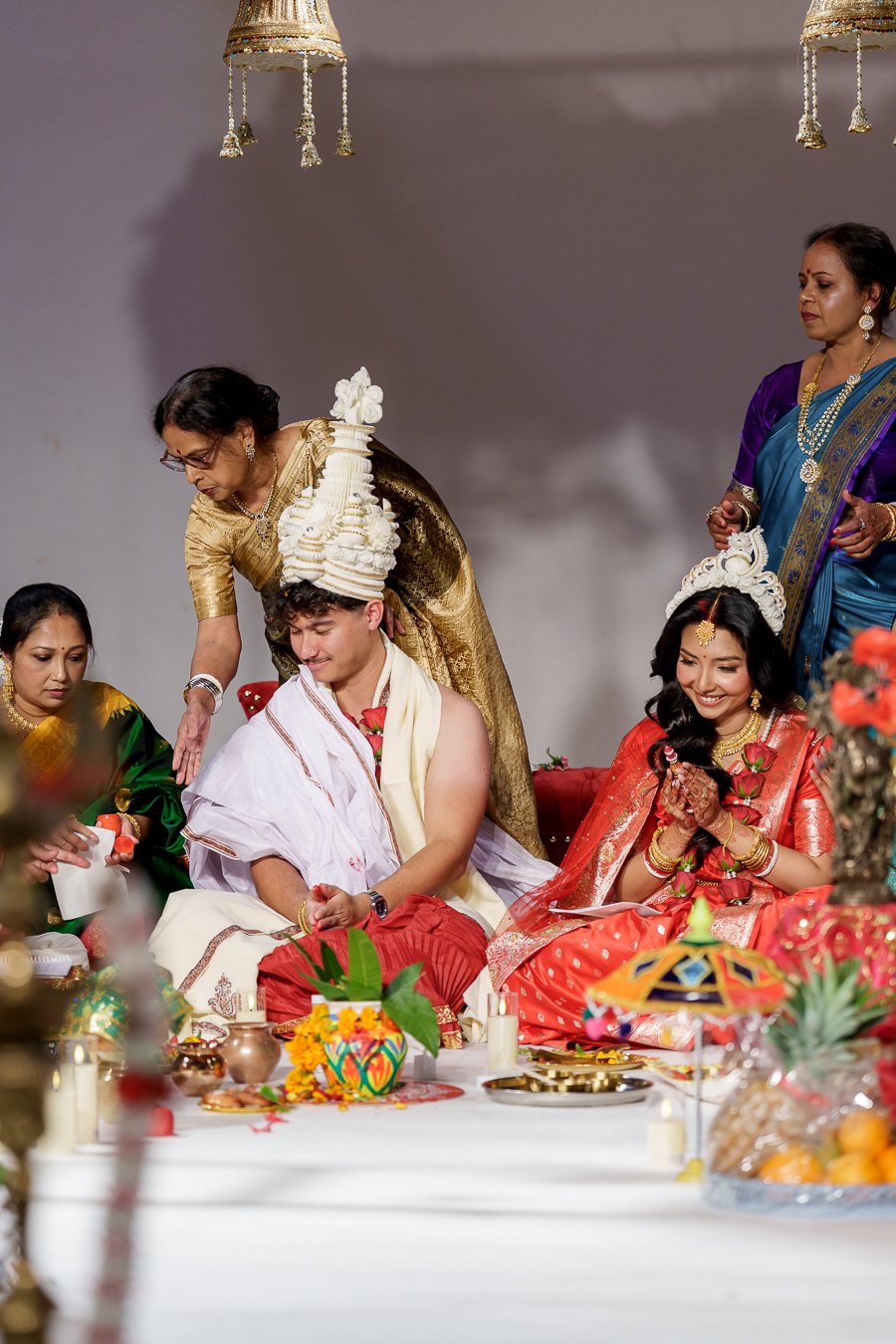 Amrita's mum give presents to Casey