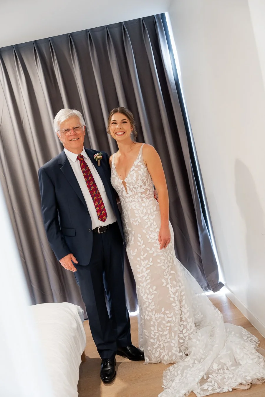 The bride took a photo with her father