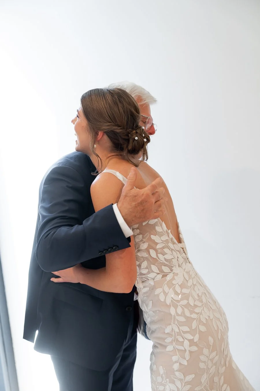 The bride hugged her father