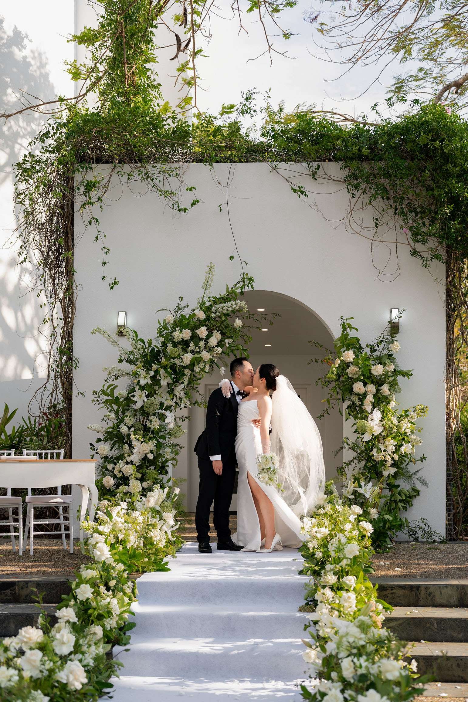 Wendy and Alex share their first kiss in their RACV Gold Coast wedding