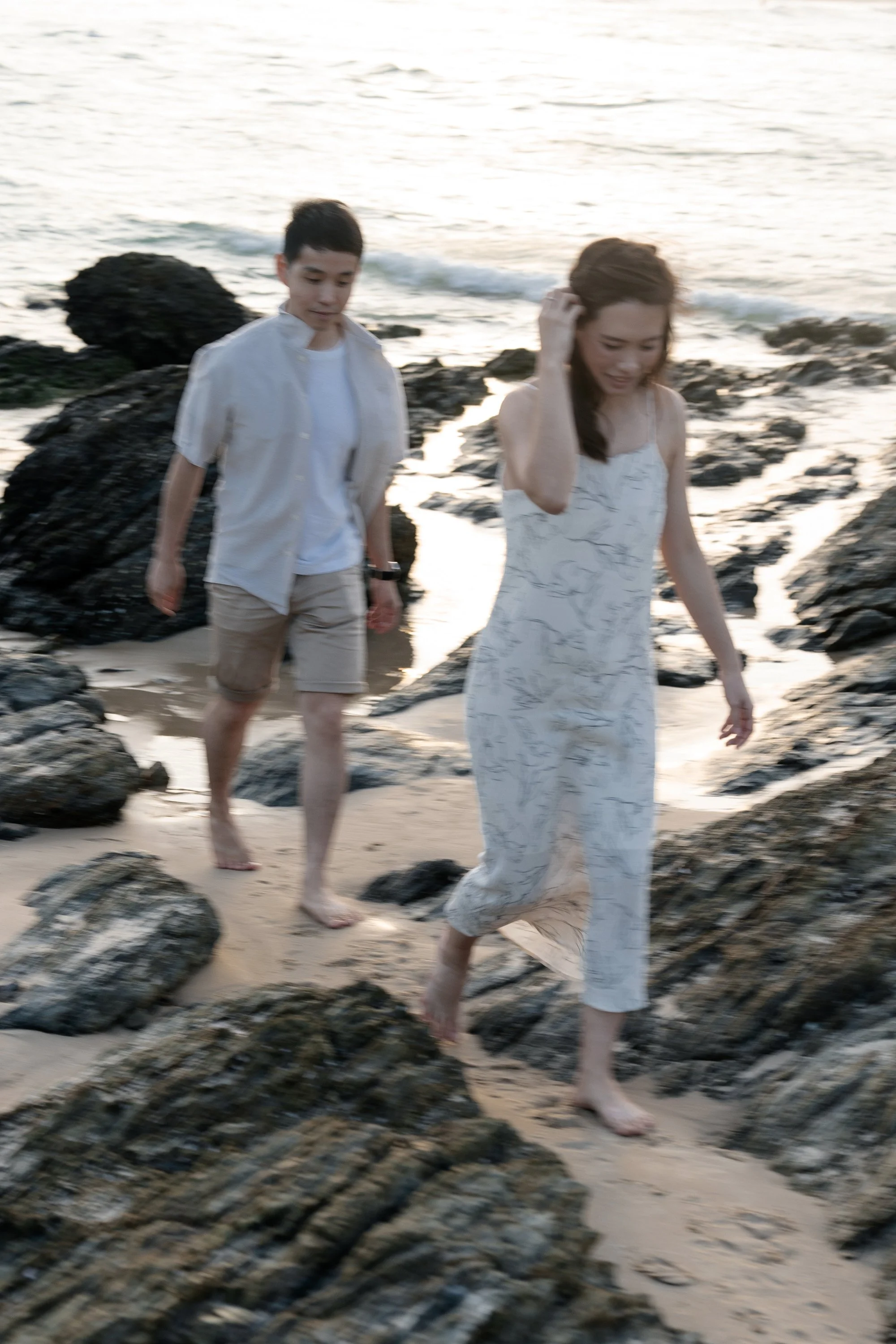 Krystel walking in front of Paul in Gold Coast Currumbin Alley