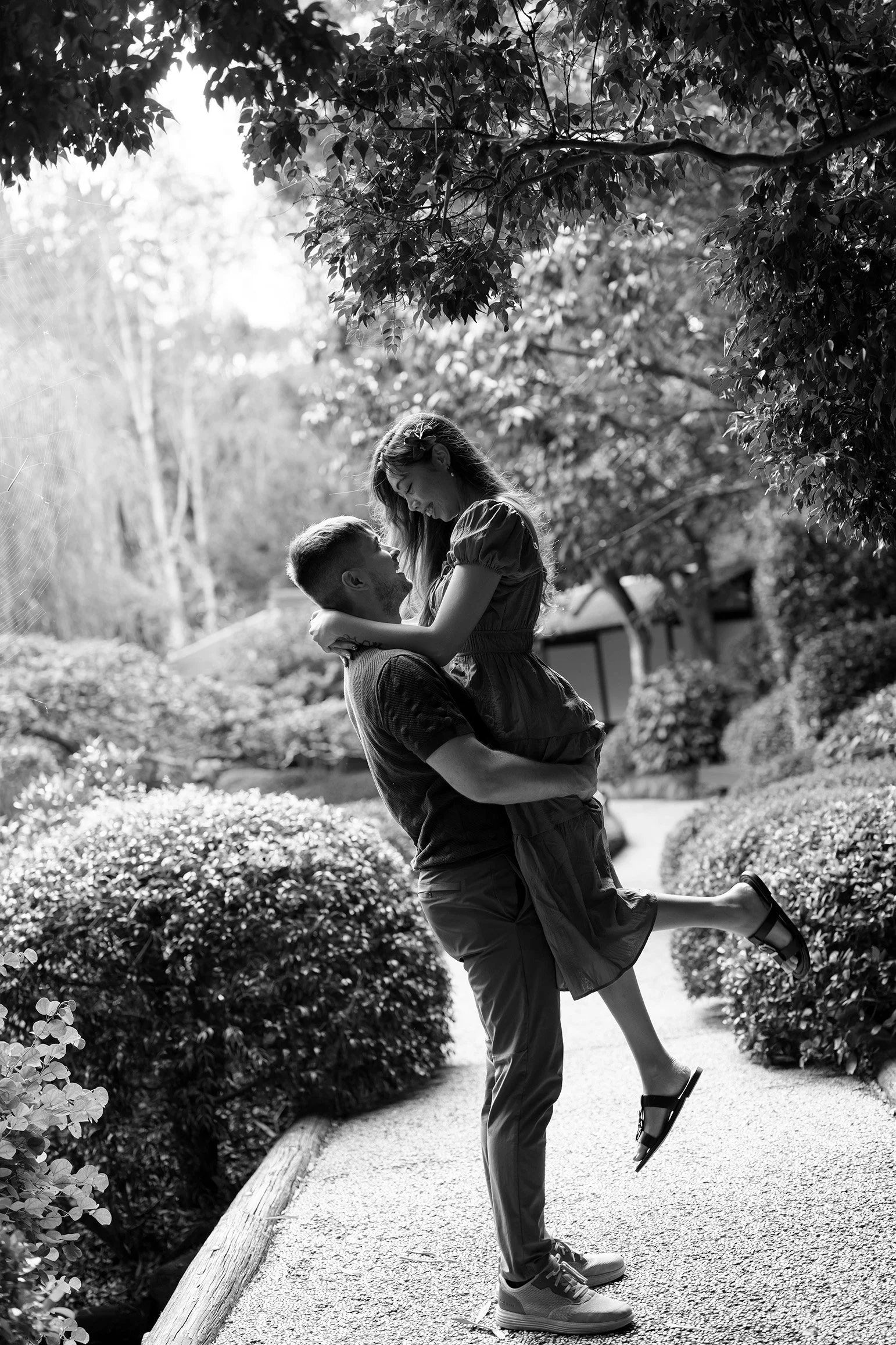 Kyle lifted Ruby up, her arms resting on his shoulders, her feet rising off the ground as they gazed into each other’s eyes.