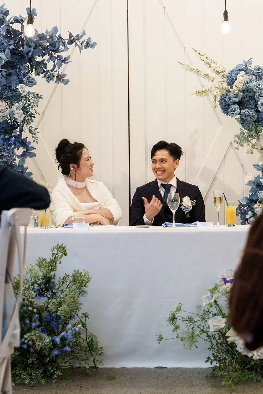 Michael thum to Lisa and Lisa laughing