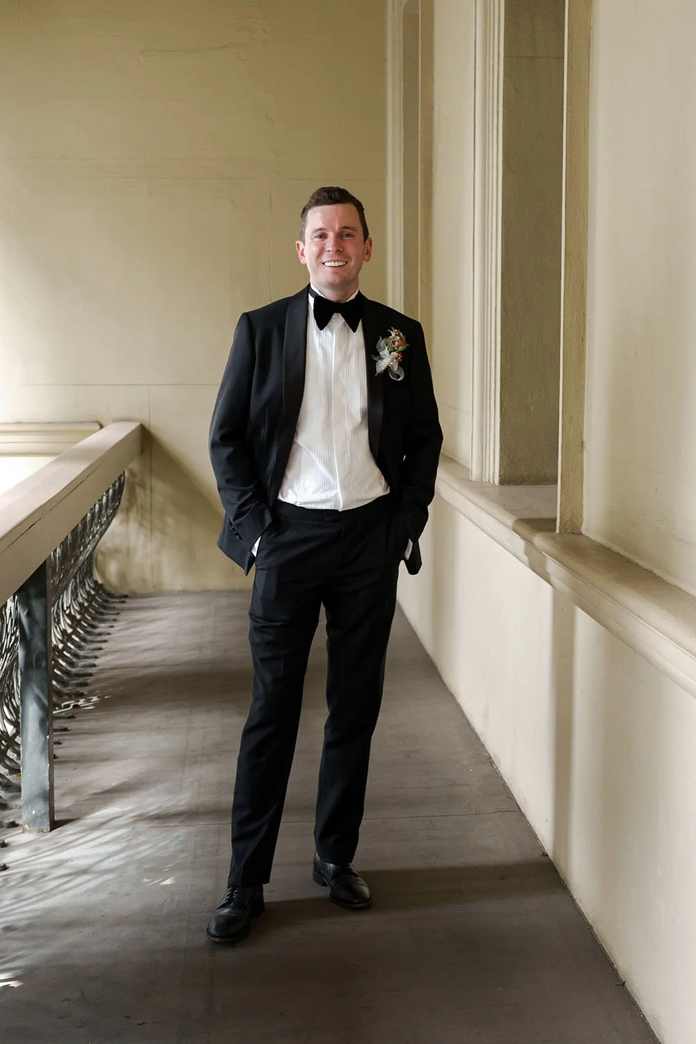 groom Cliffe two hands inside the pants pocket look forward