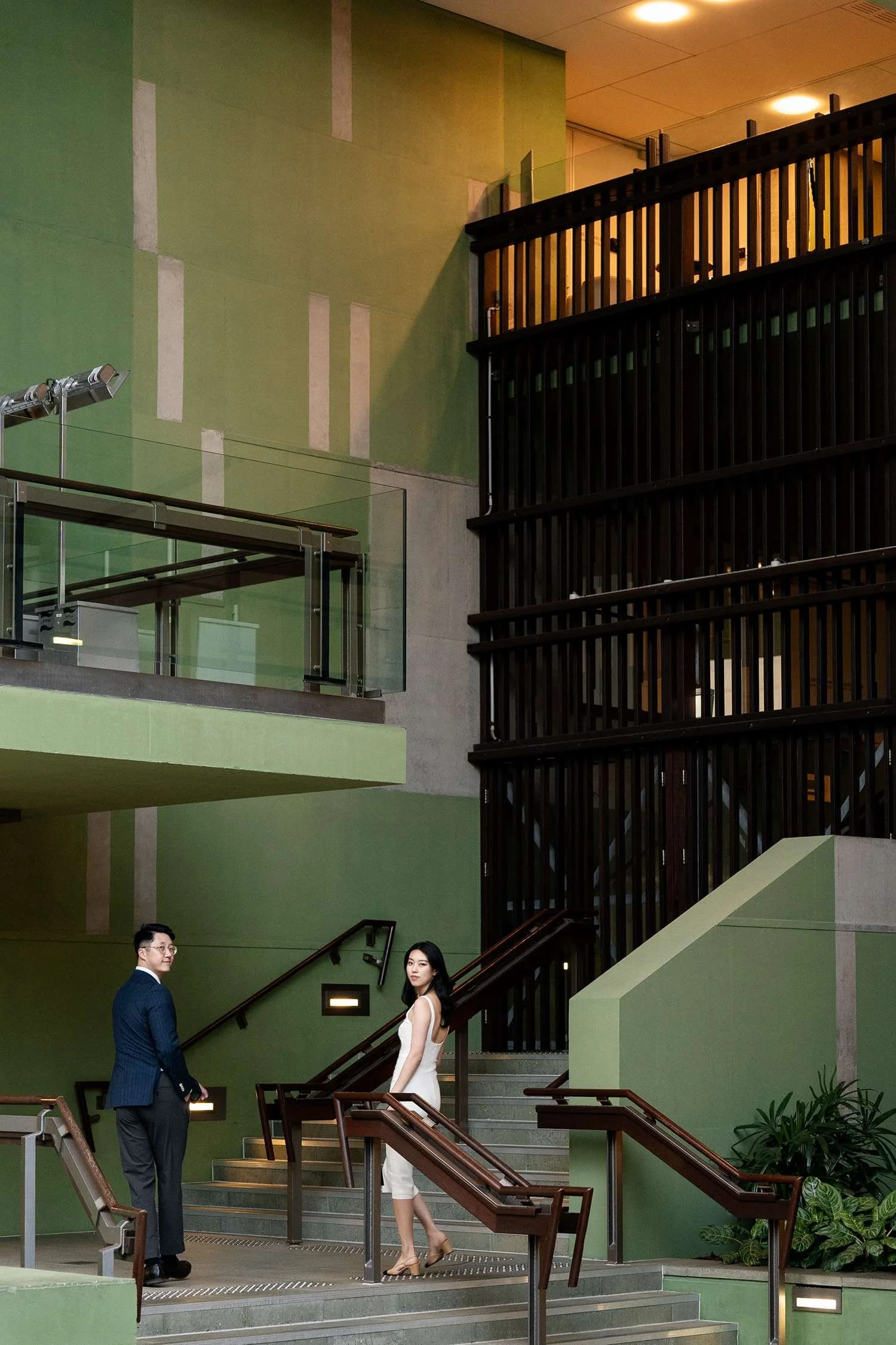 Kath walking alone, her graceful stride capturing a moment of quiet reflection and elegance, set against a serene backdrop