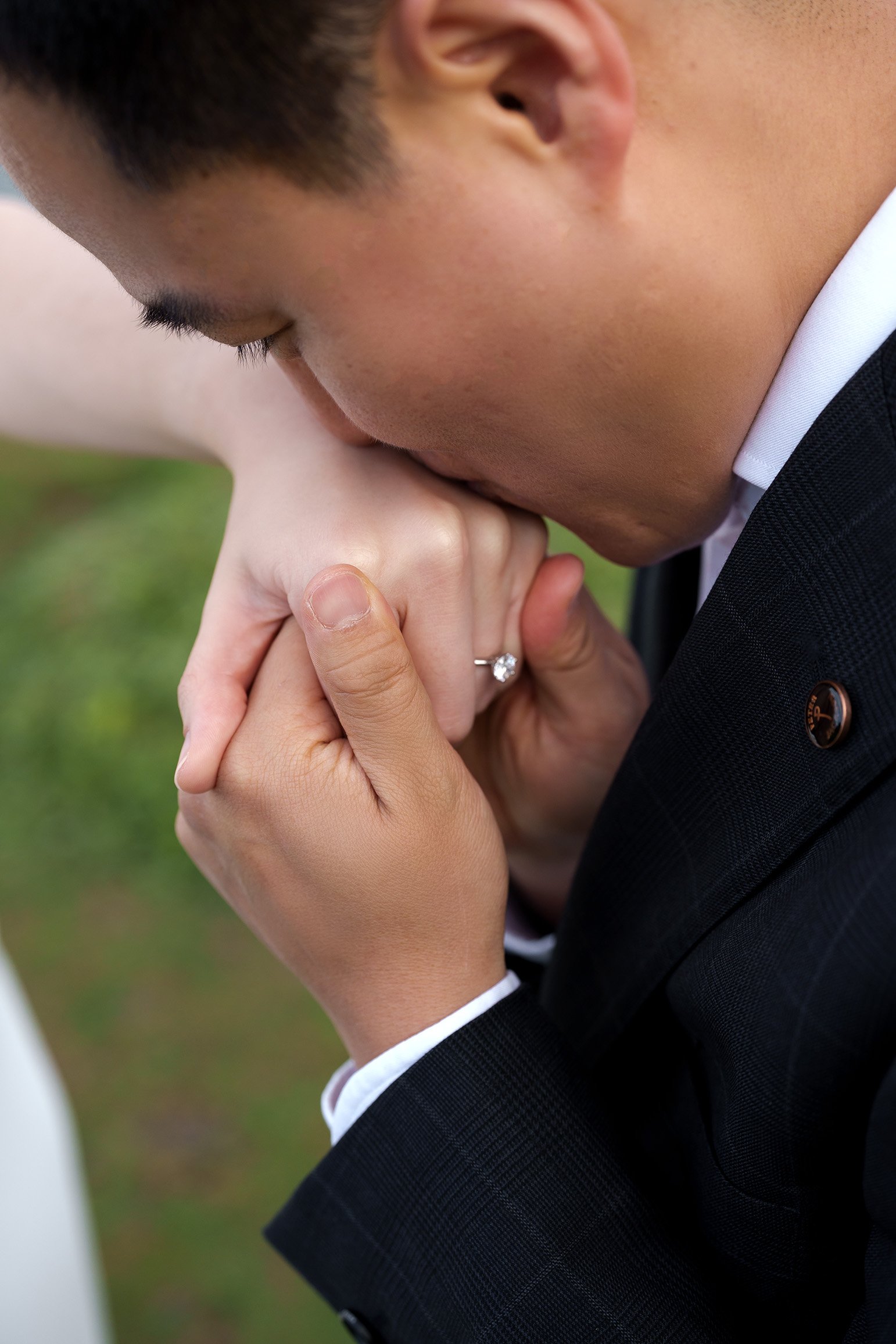 Silva kissing Margaret's hand and engagement ring on her hand