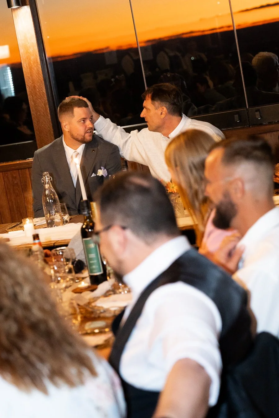 groom dad touching his head
