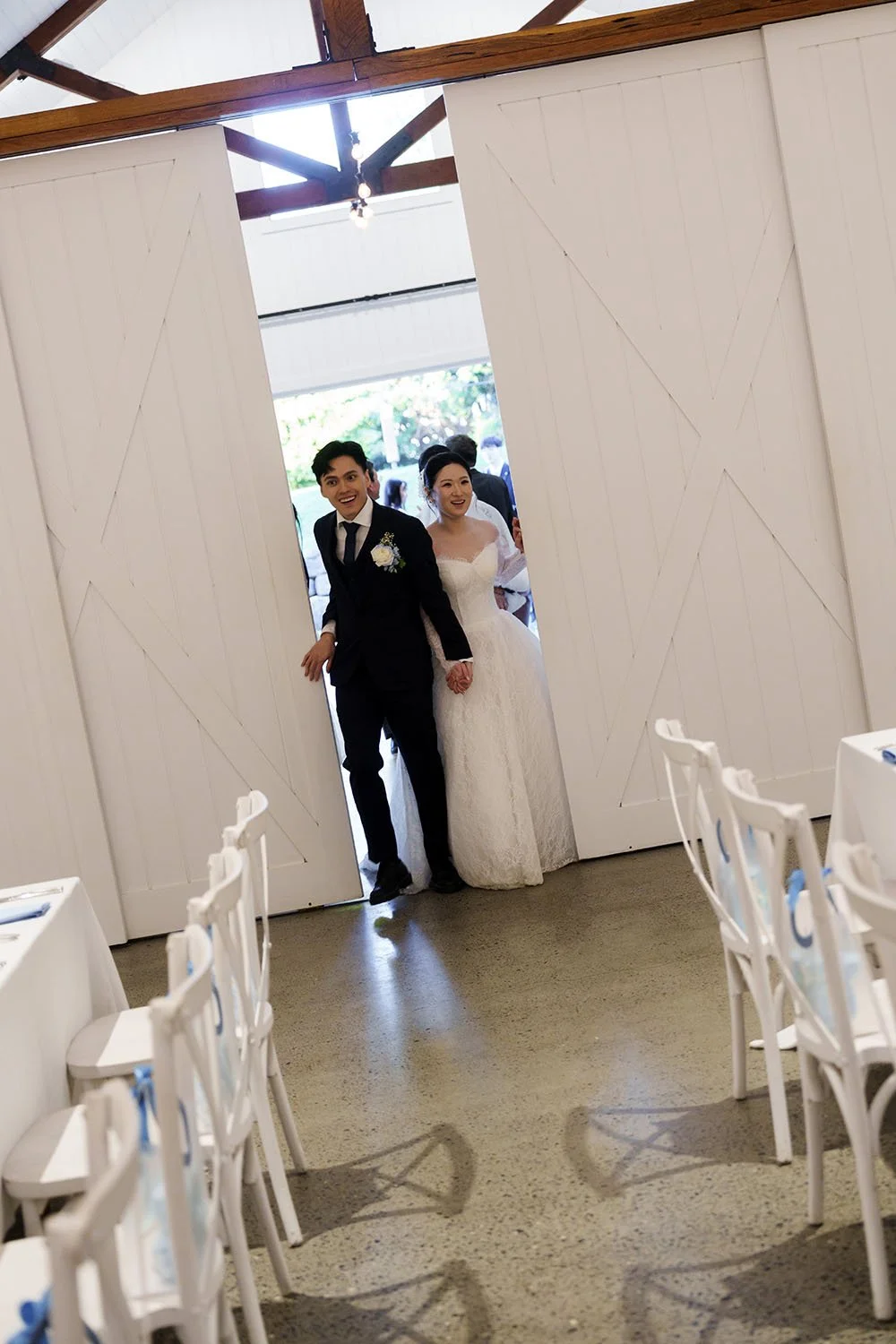 Michael and Lisa open the barn door see their reception room with so suprise