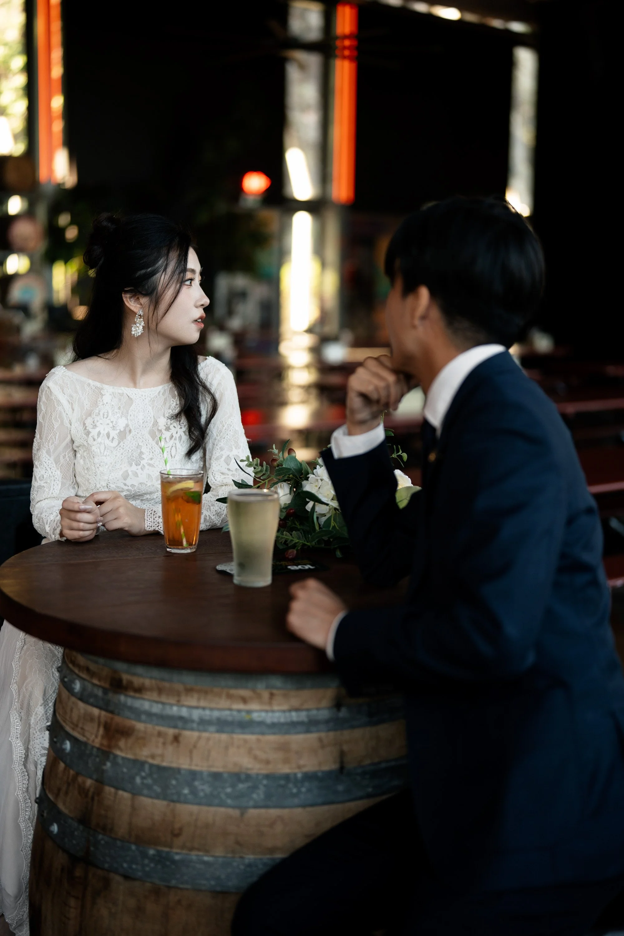 bride look away when groom Leo look at her