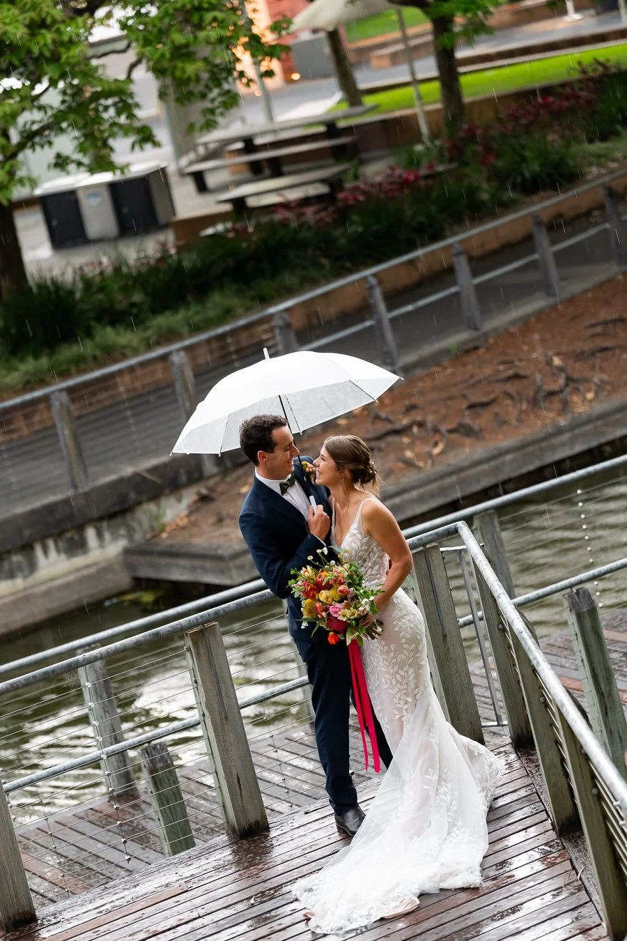 bride and groom next to each other and they laugh and talk