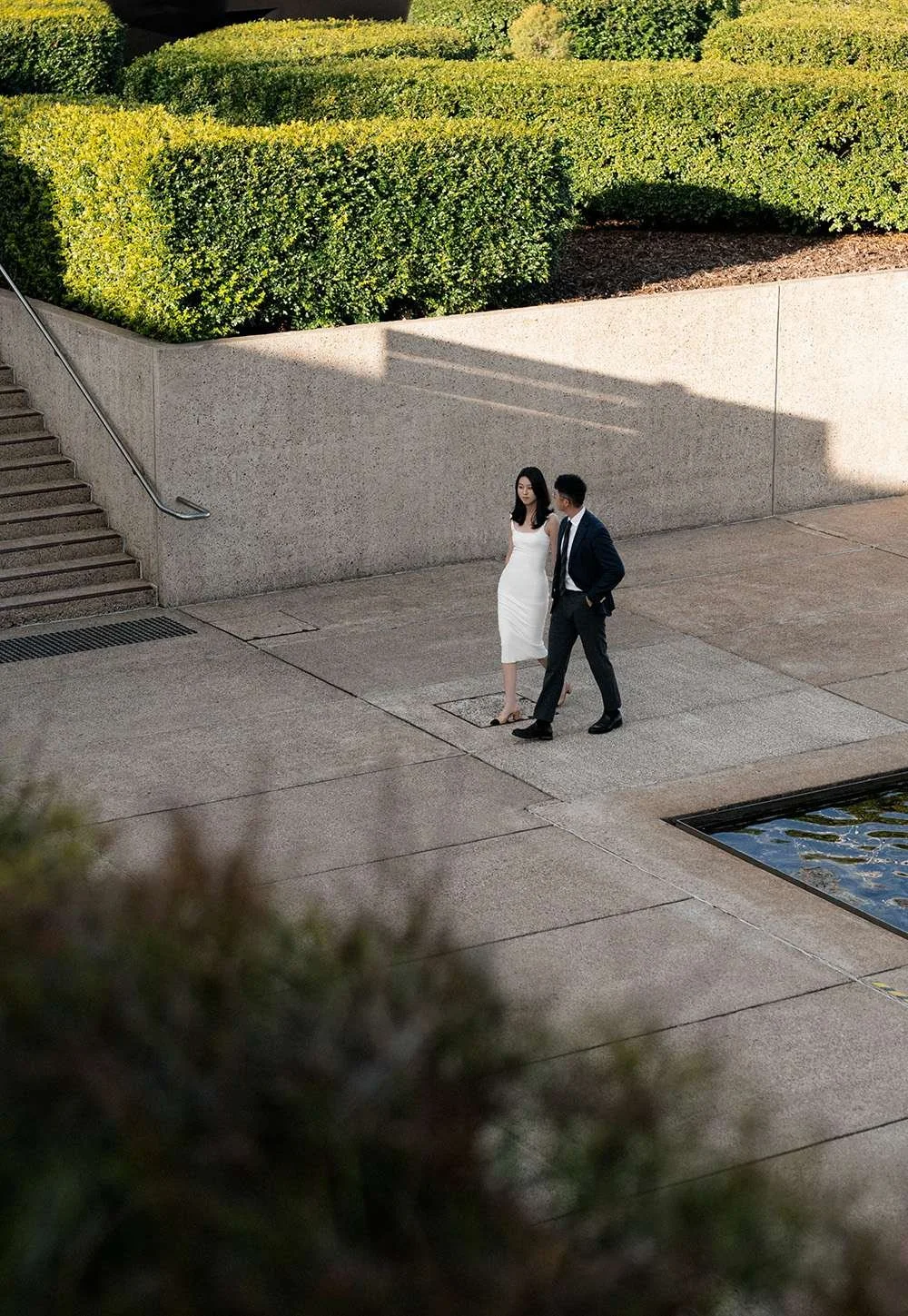 Kath and Dave walking together, with Dave looking at Kath affectionately, capturing a moment of love and connection as they move in sync