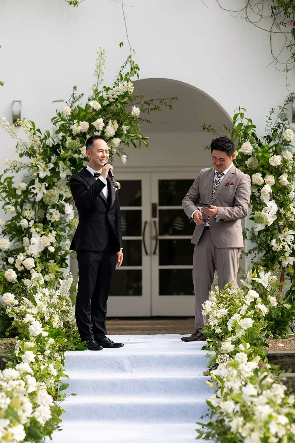 groom speaking on a mic wiht welcome speach