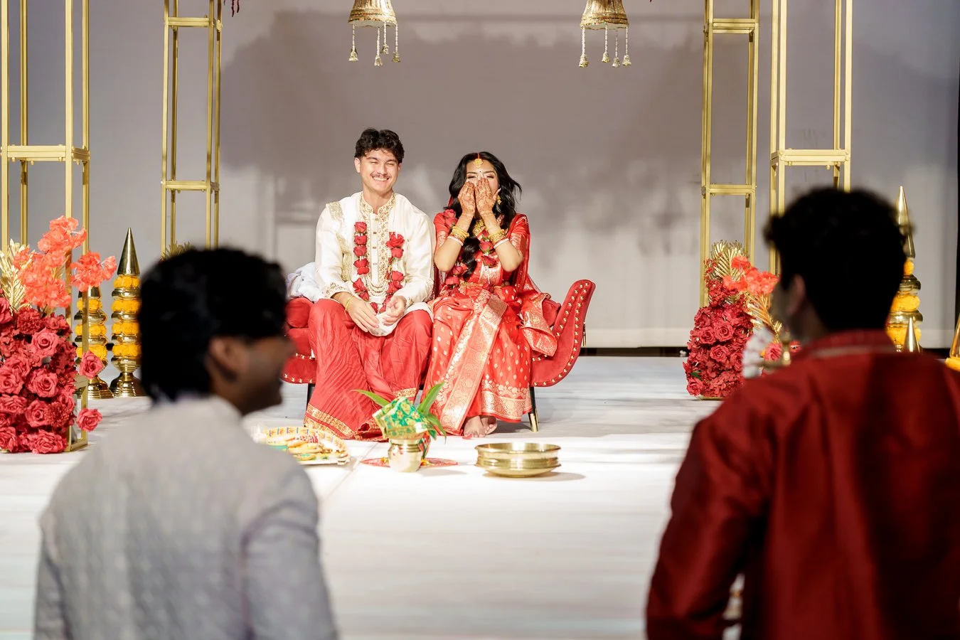 Amrita cover her mouth smell and Casey smells to their guests