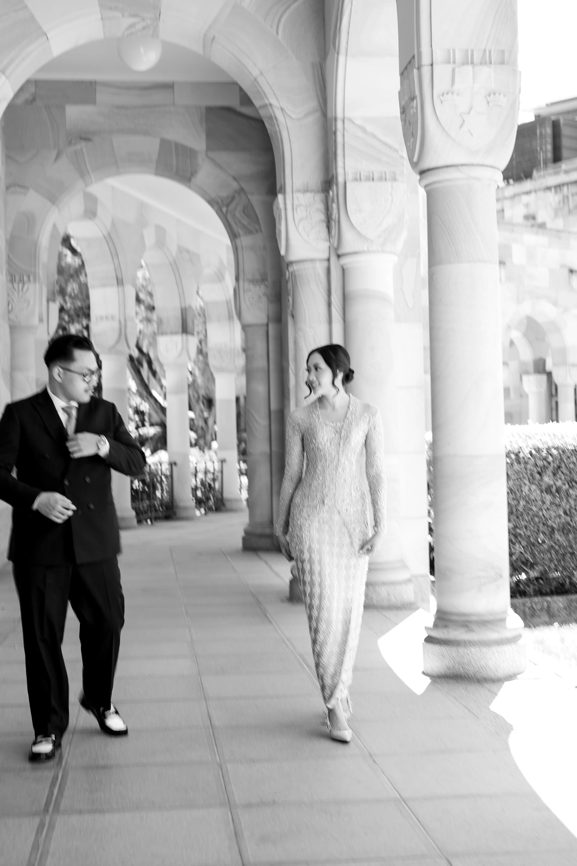Bella and Aka look at each other walking together