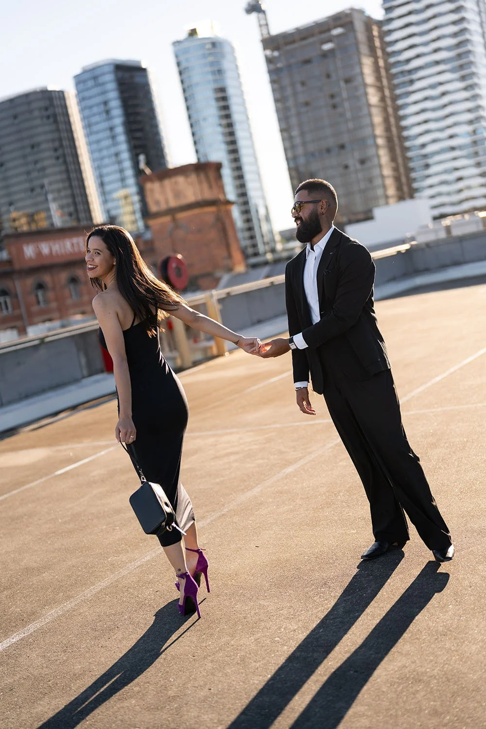 Jasmin turn her body look the Brisbane wedding photographer Whistler and Jay look at her while walking